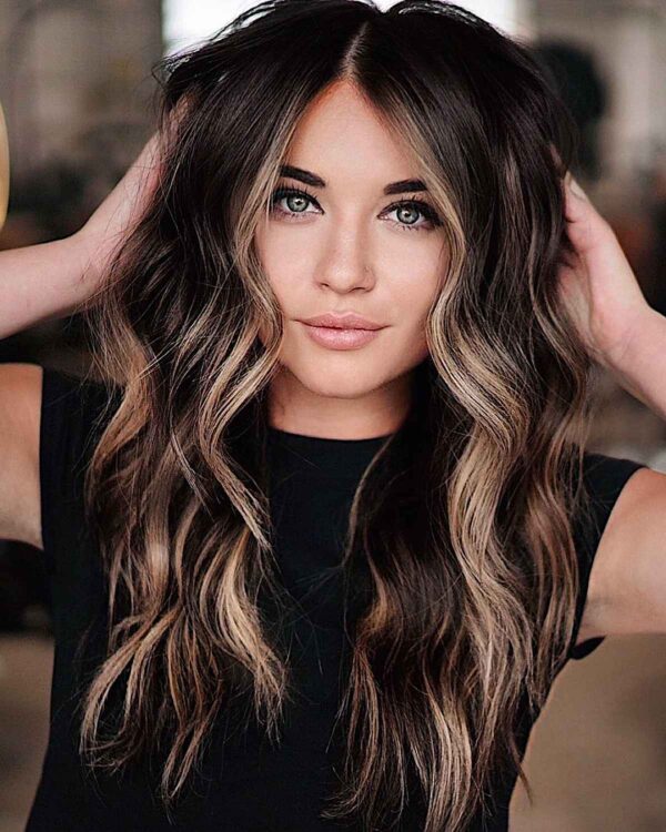 A Dirty blonde money piece on dark hair