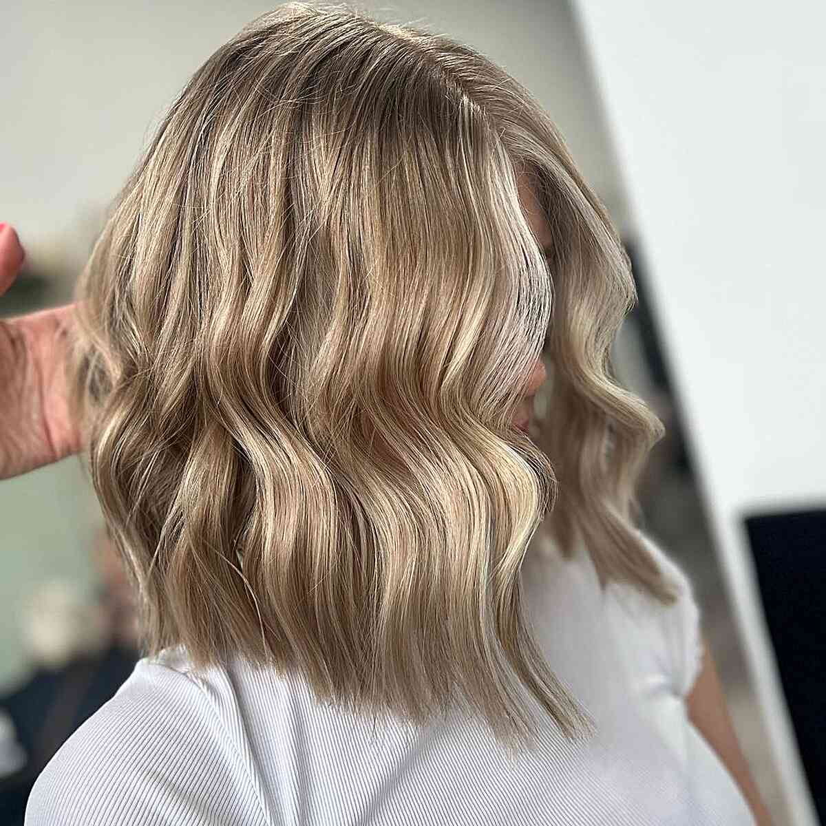Dirty Summer Blonde Balayage for Shoulder-Length Long Bob with Waves