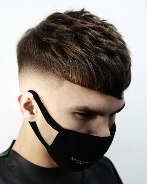 Edgy Disconnect Undercut with Mid Bald Fade