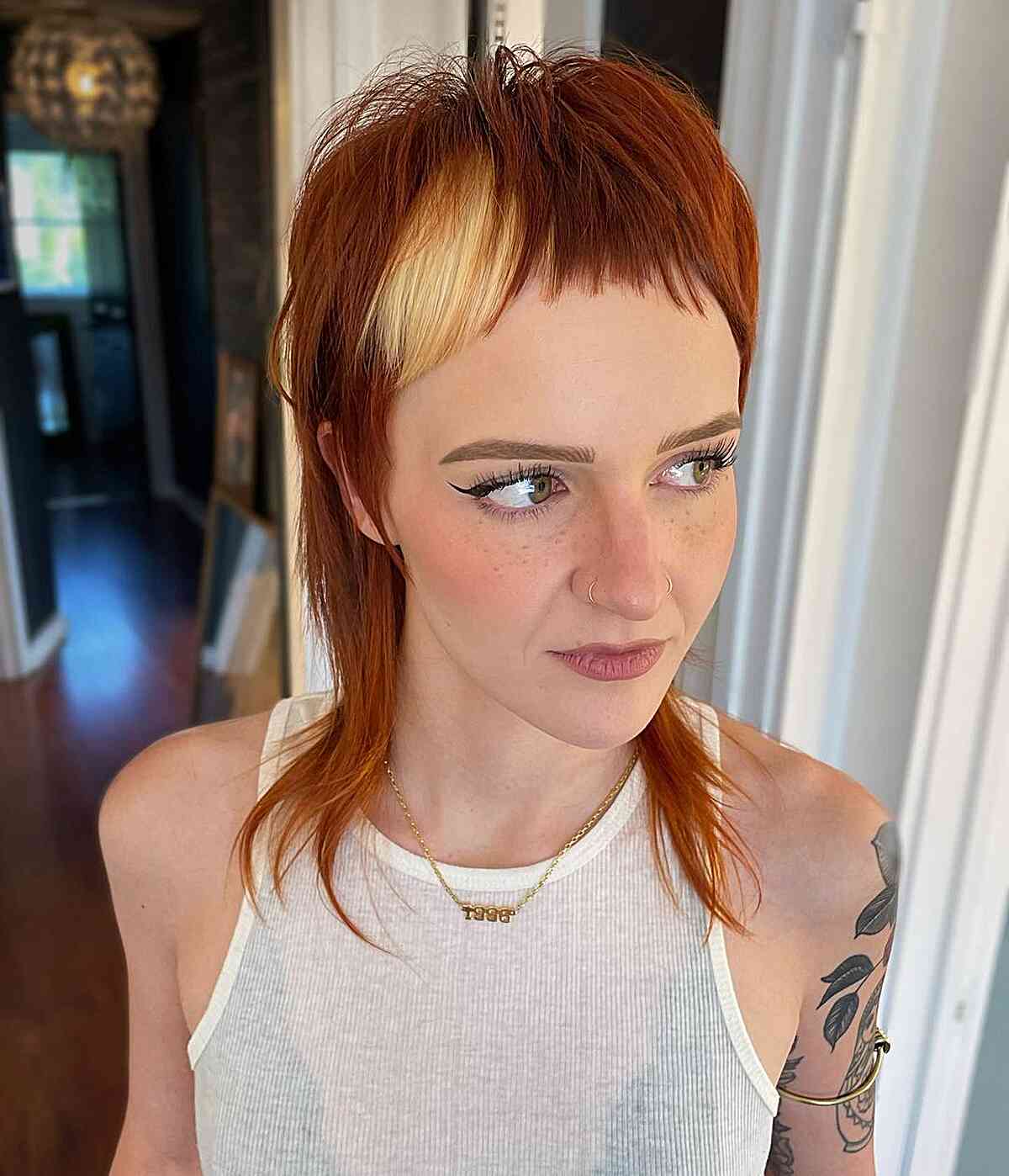 Disconnected Copper Shaggy Mullet with Fringe for girls with an edgy vibe