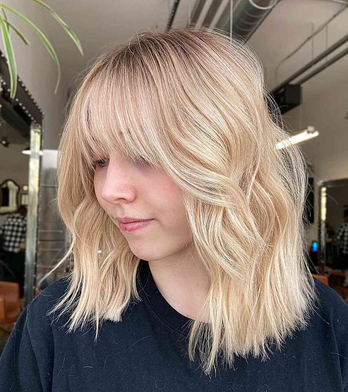 Shoulder-Length Dusted Shaggy Layers with Wispy Bangs