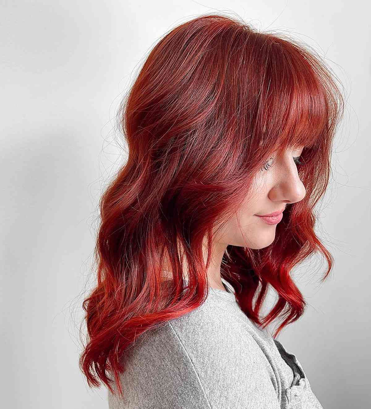 dyed red hair with bangs