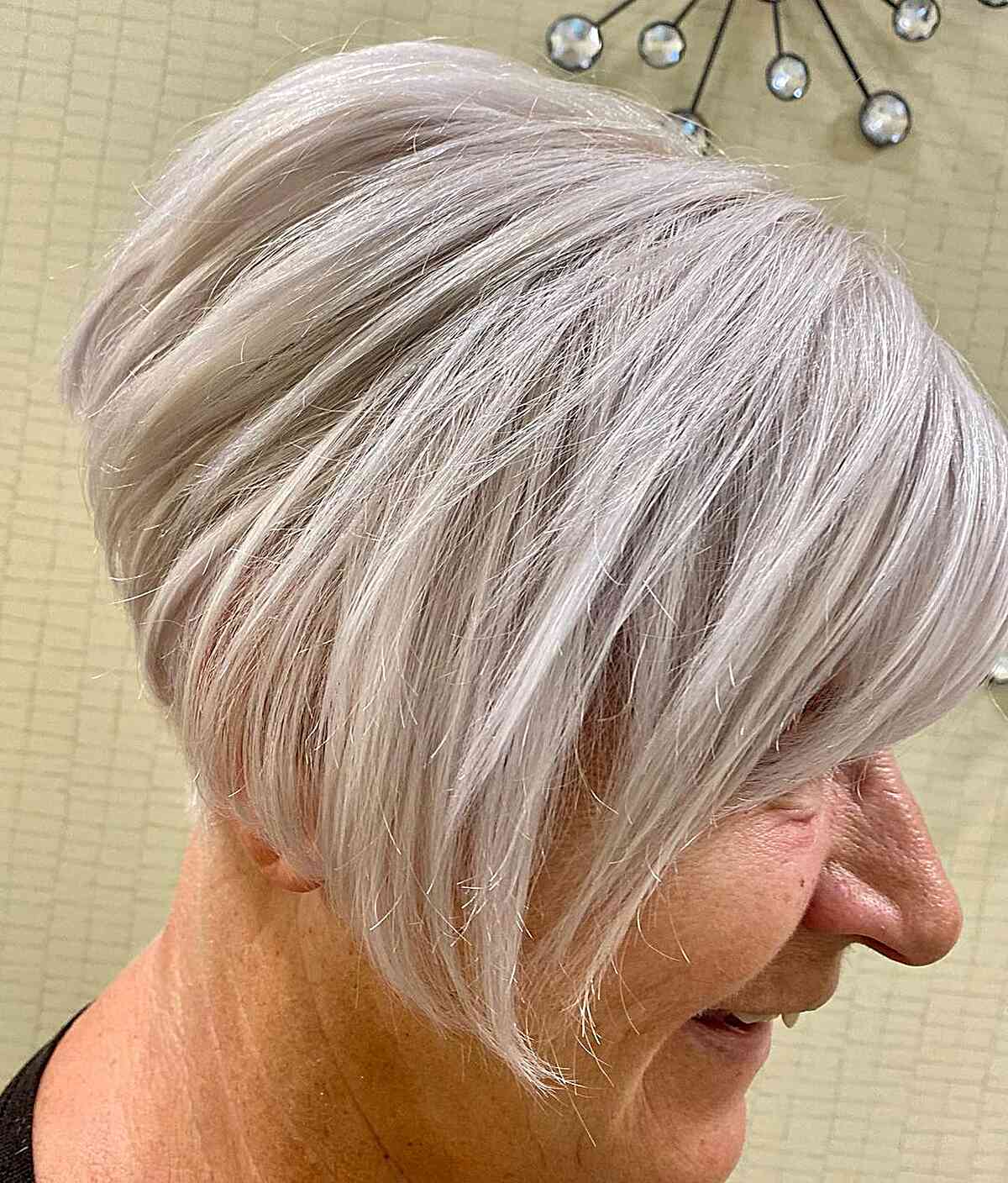Ear-Length Icy Asymmetric Bob Cut for older women with sass