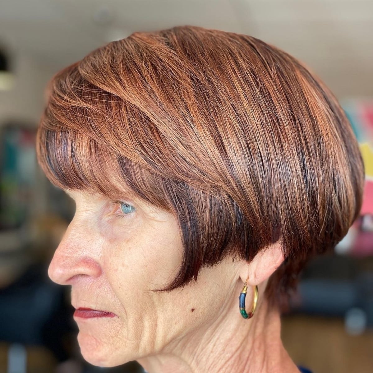 Ear-Length Layered Bob on a Copper Brown Hair Color