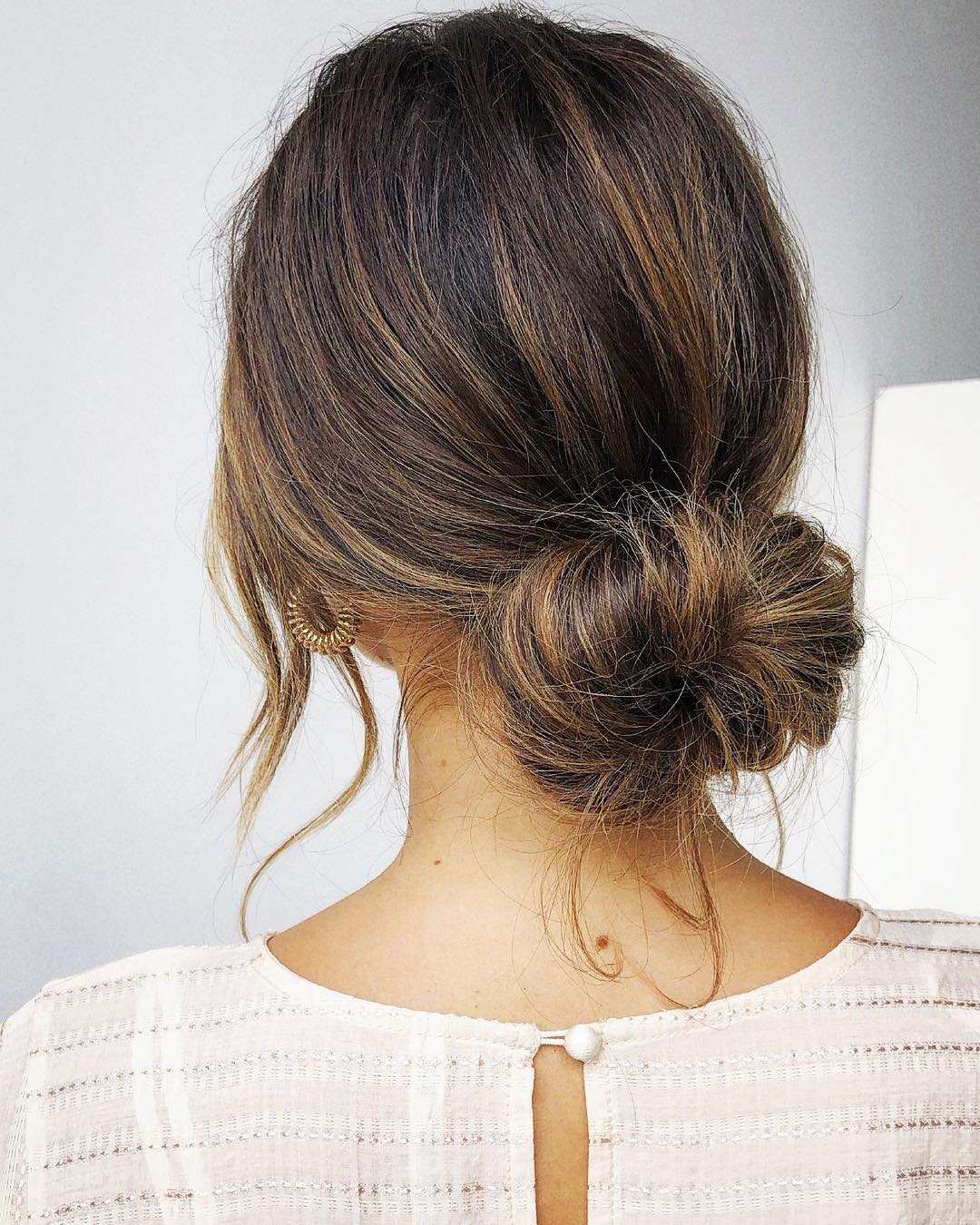 16 Cute & Easy Bun Hairstyles to Try in 2021