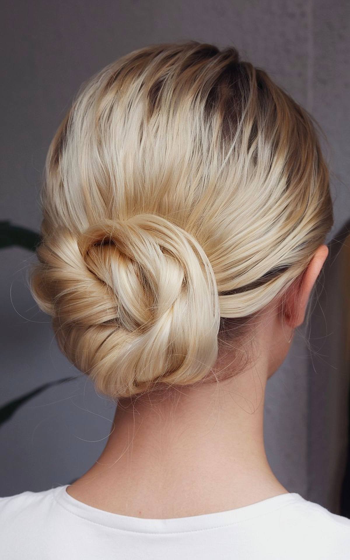 Easy professional hairstyle for long hair with sleek twisted bun