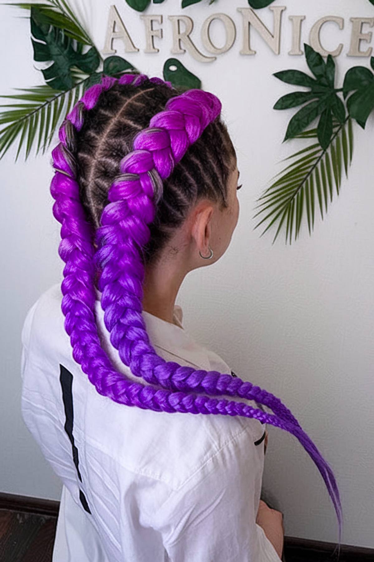 Vibrant purple chunky braids for an easy rave hairstyle