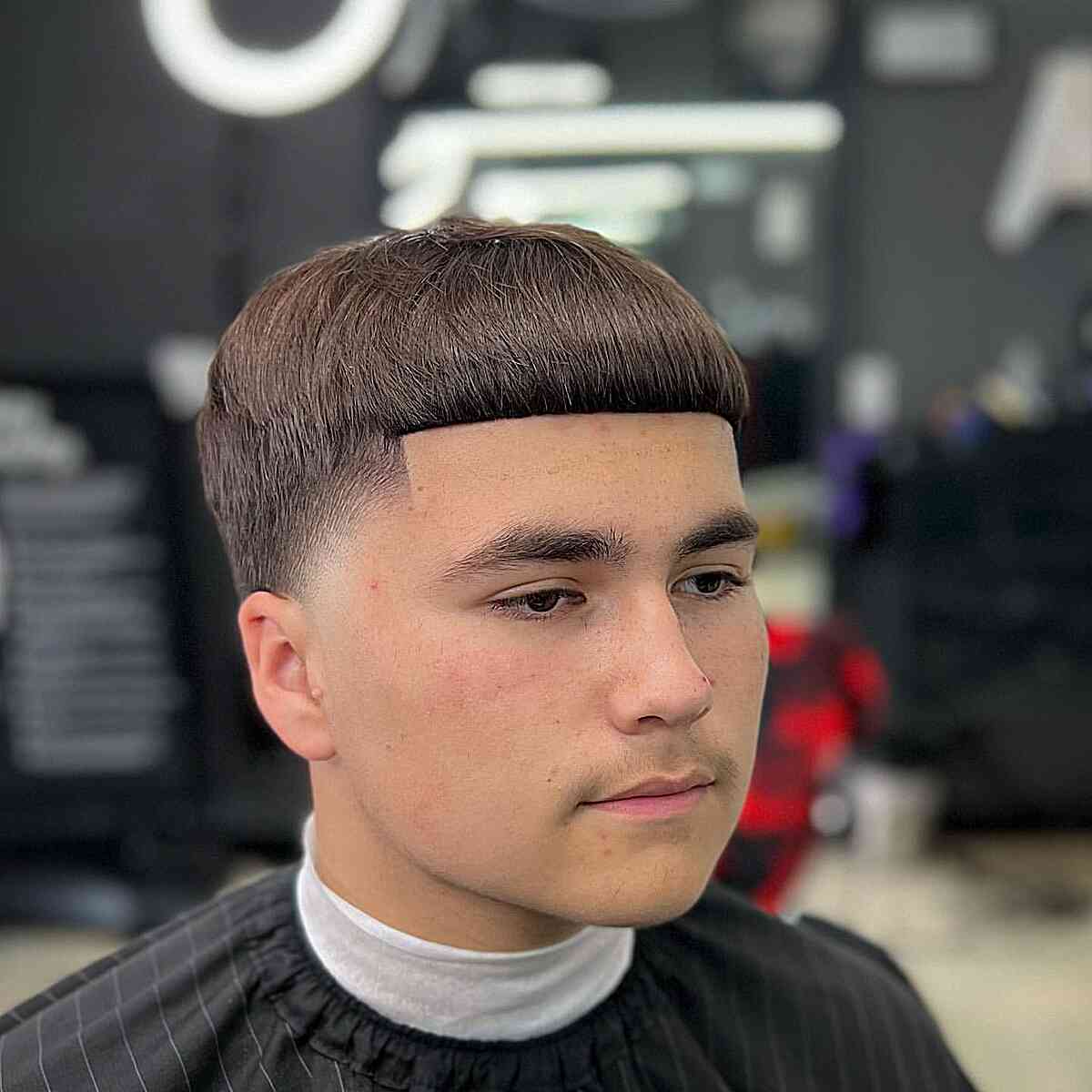 Edgar Bowl Cut with High Bald Taper and Blunt Bangs for Young Gentlemen