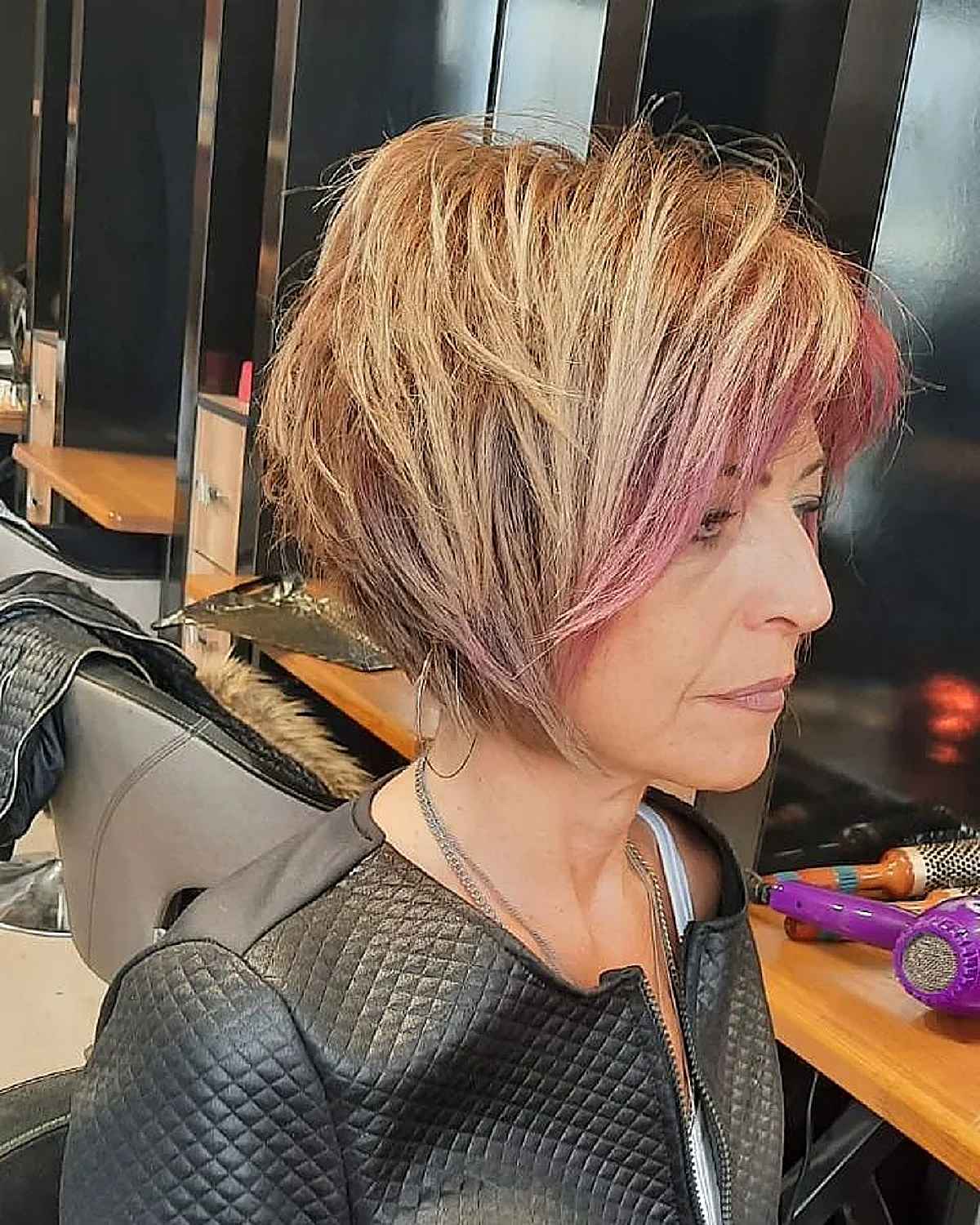 Edgier Short Bob with Lots of Layering on a sixty-year-old woman