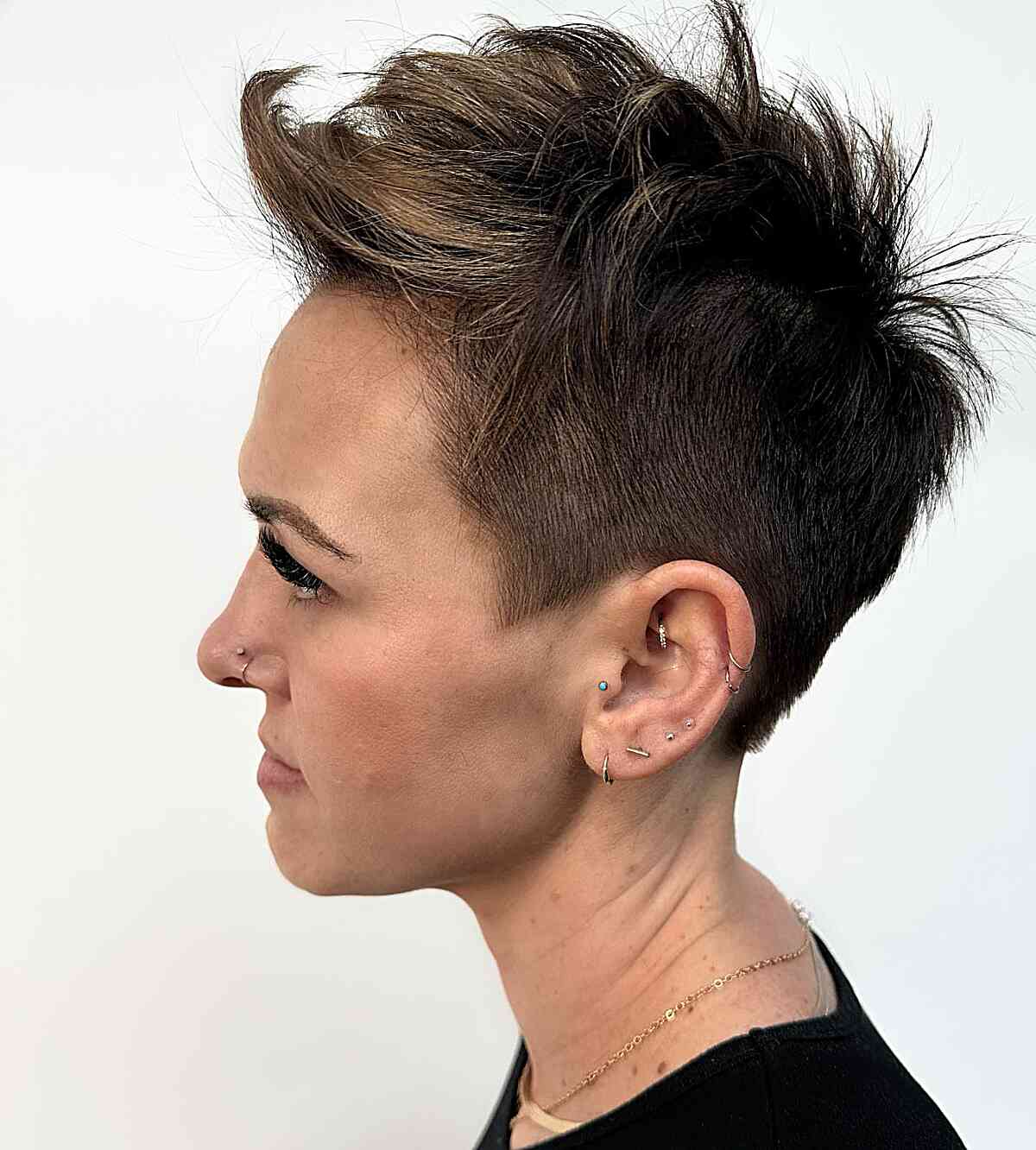 Edgy and Voluminous Brunette Pixie for girls with short hair