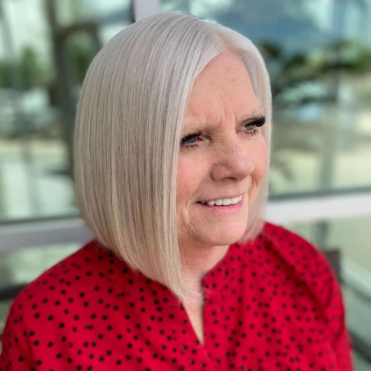 Edgy asymmetrical lob for women over 60 with straight hair