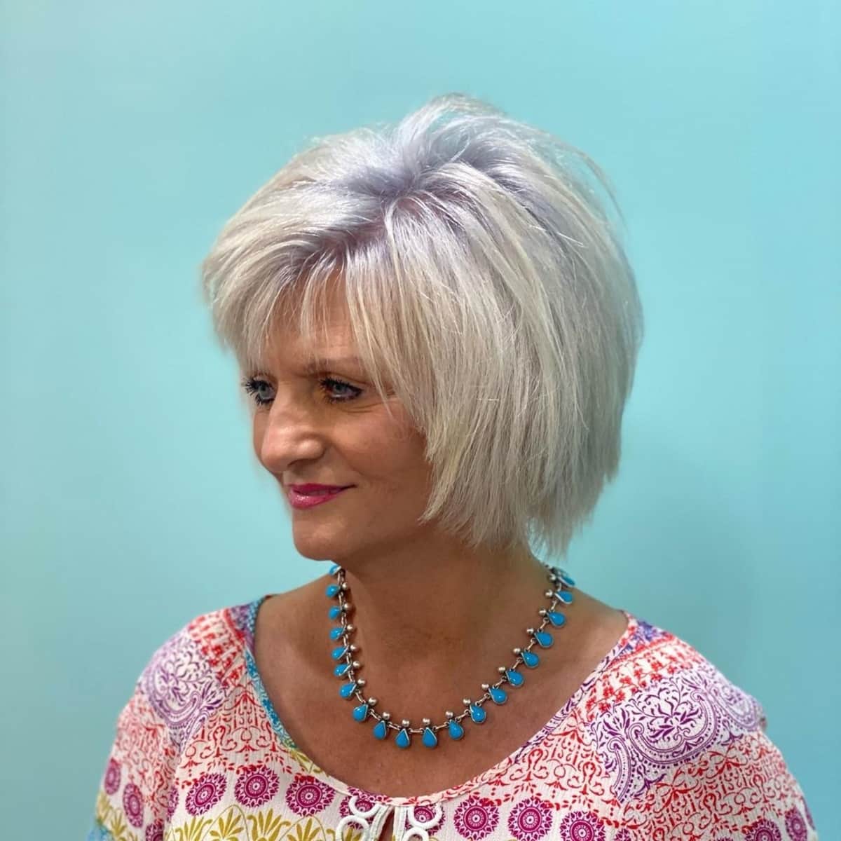 Edgy chin-length shag for an older woman over the age of 50