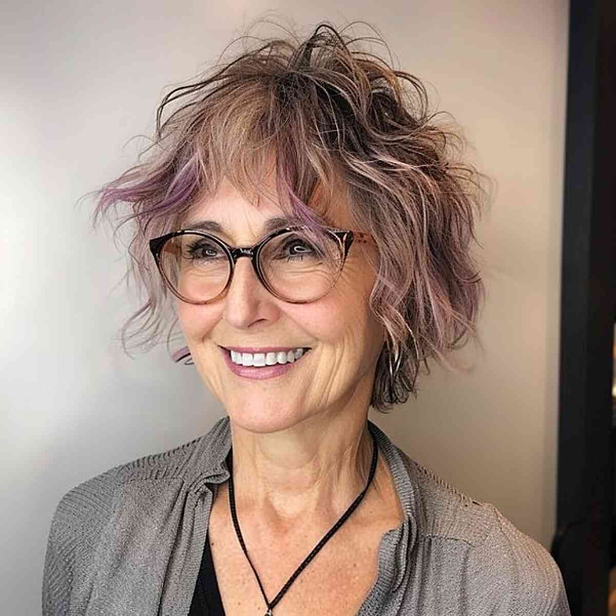 Edgy Layered Haircut for Thin Haired Women Over 50 with Glasses