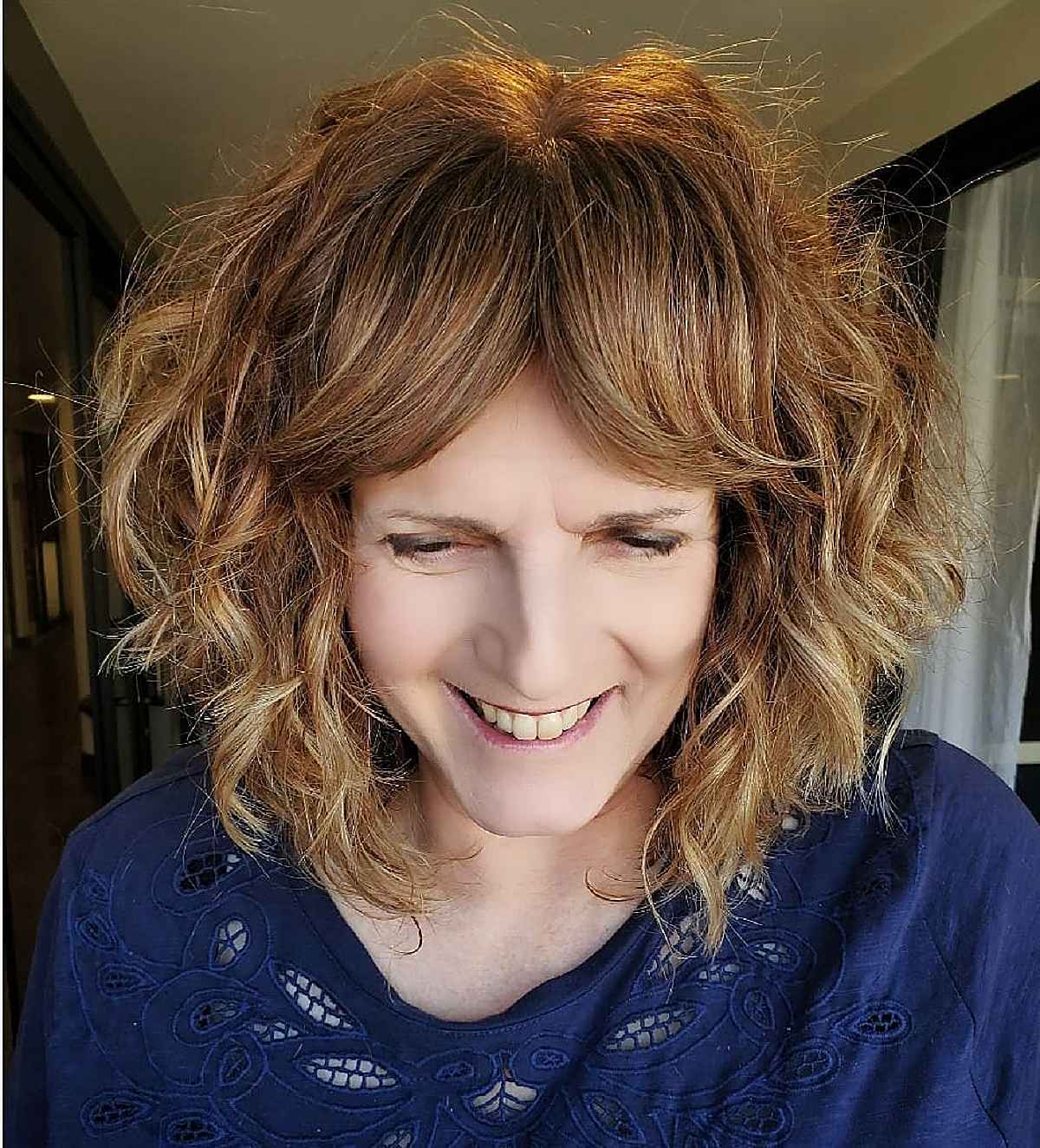 Edgy Lob with Curtain Bangs for Women Over 40
