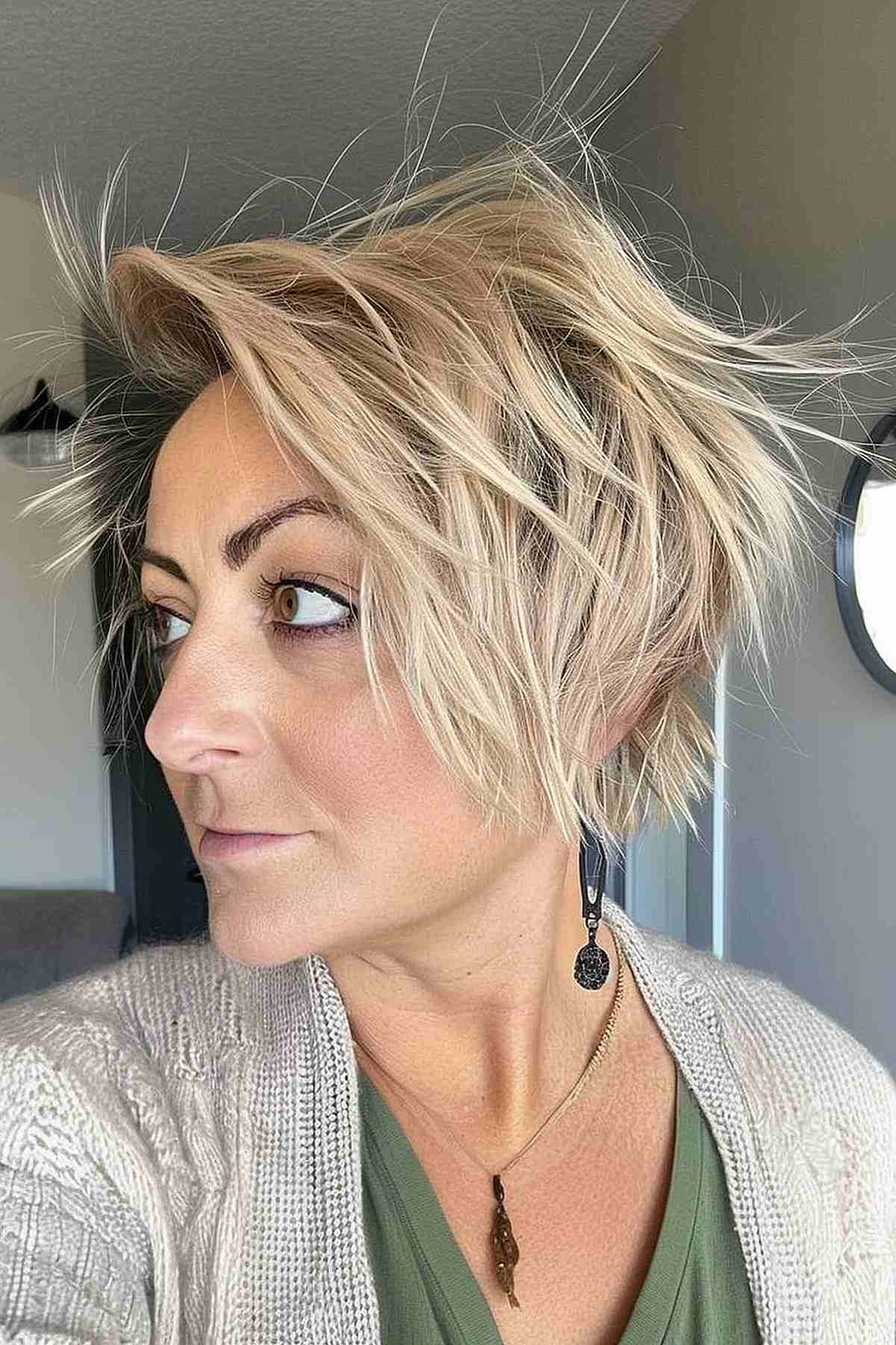 Woman with an edgy long choppy pixie bob hairstyle