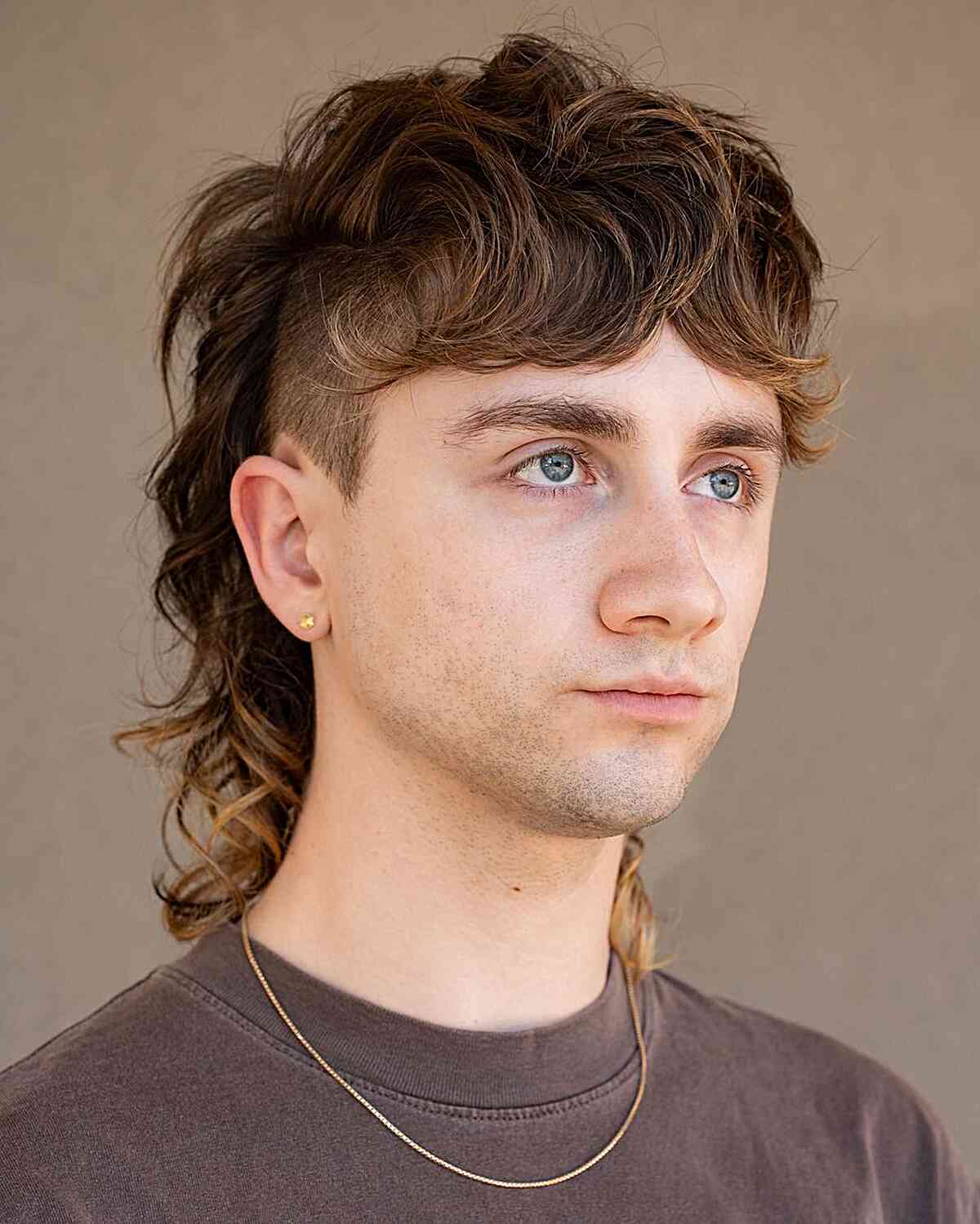 Edgy Mullet Haircut for Guys with Medium-Length Hair