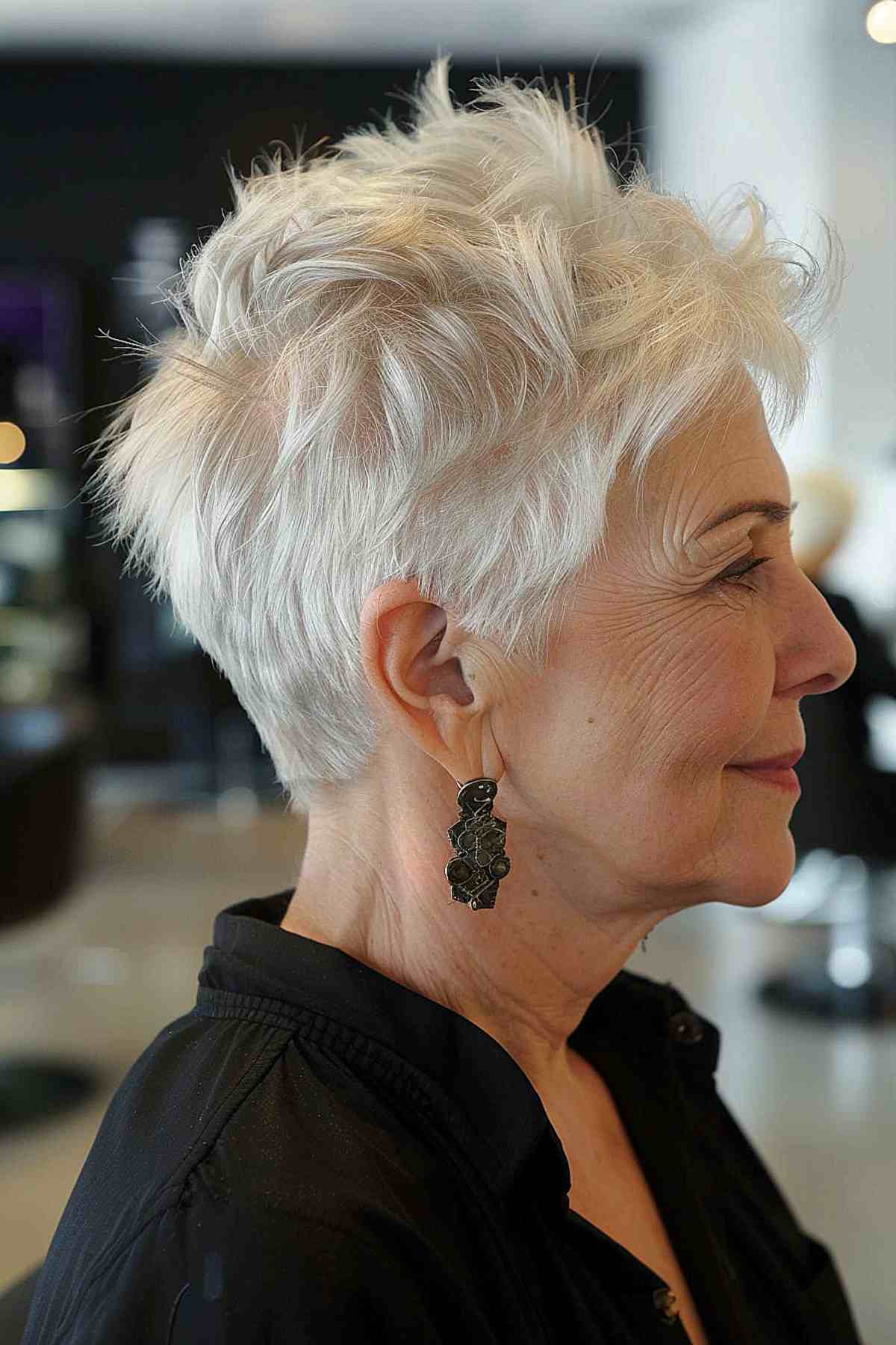 Edgy pixie haircut with textured layers for older women