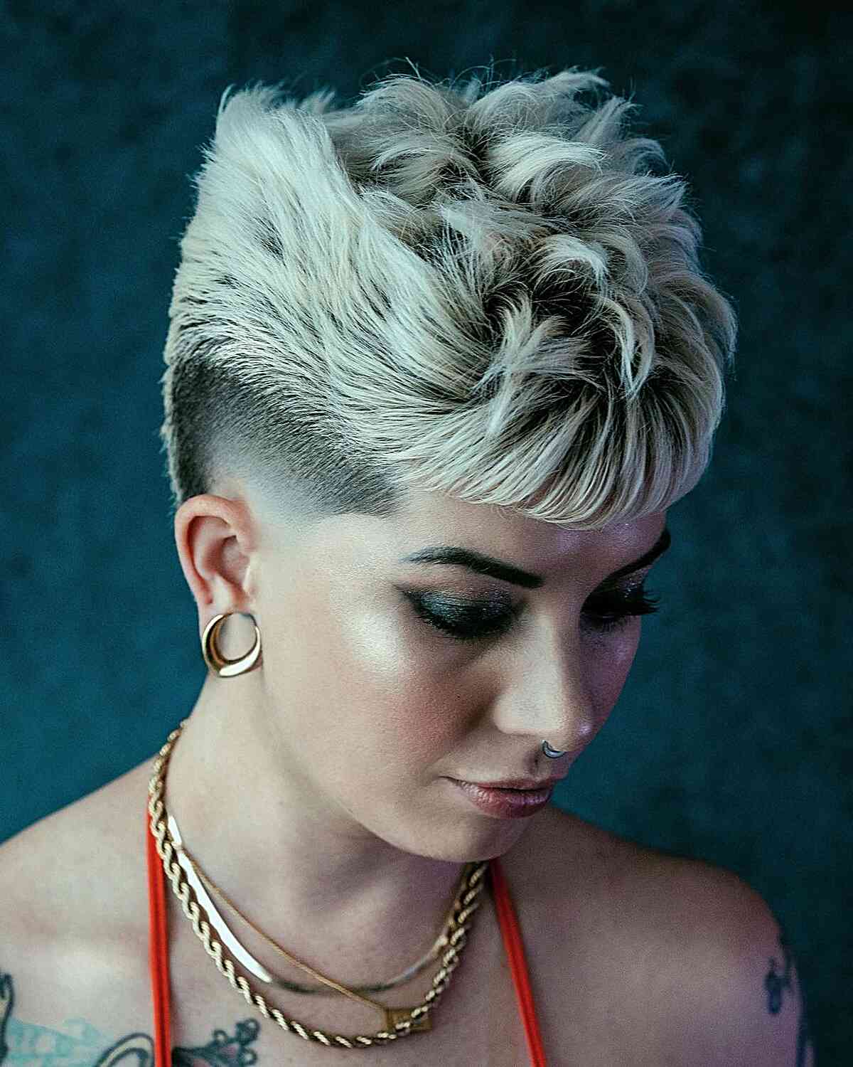 Edgy Platinum Messy Top with a Mid Fade for Older Women with textured hair