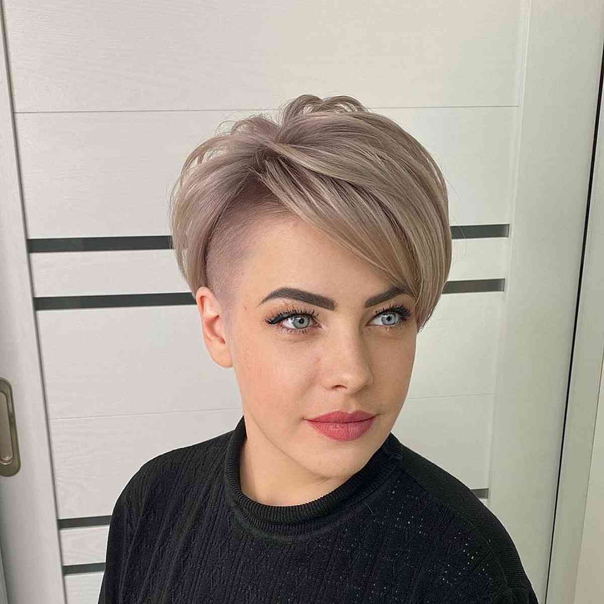 Edgy Shaved Pixie with Side Bangs and Stacked Layers