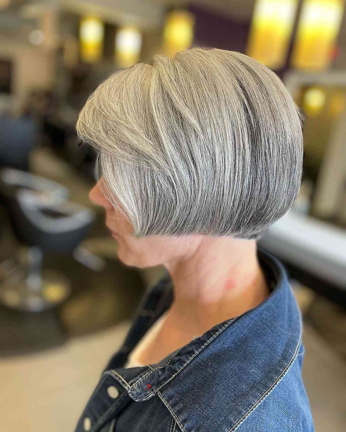 Edgy Short Jaw-Length Bob with Straight Edges and Side Bangs for Older Women Over Sixty