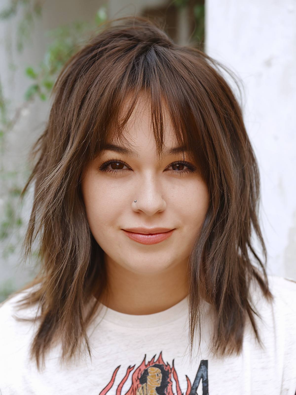 Unstyled shag haircut with soft layers on straight hair