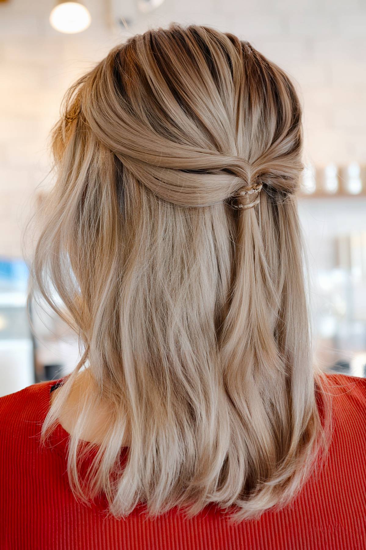 Simple shoulder-length hairstyle with a twisted crown for easy styling