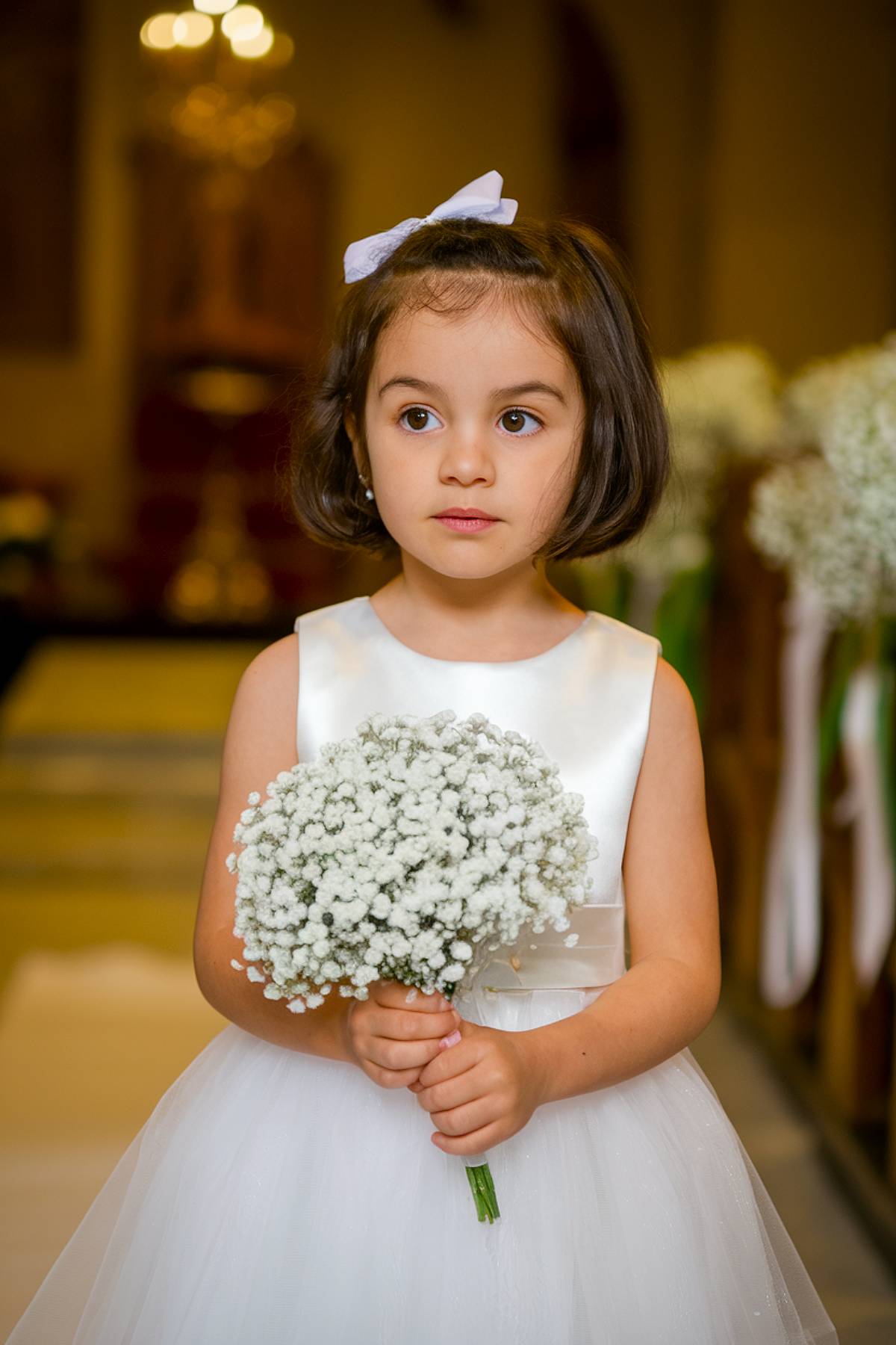 Chin-length bob haircut with soft waves for flower girls