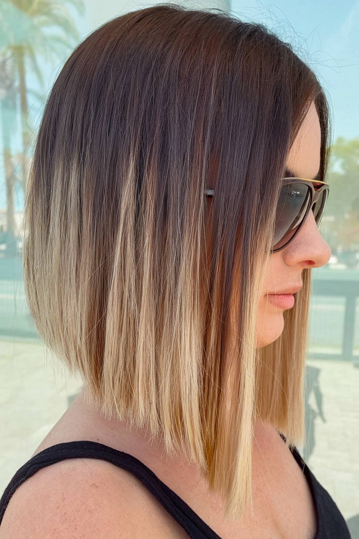 Straight angled bob haircut with ombre color fade