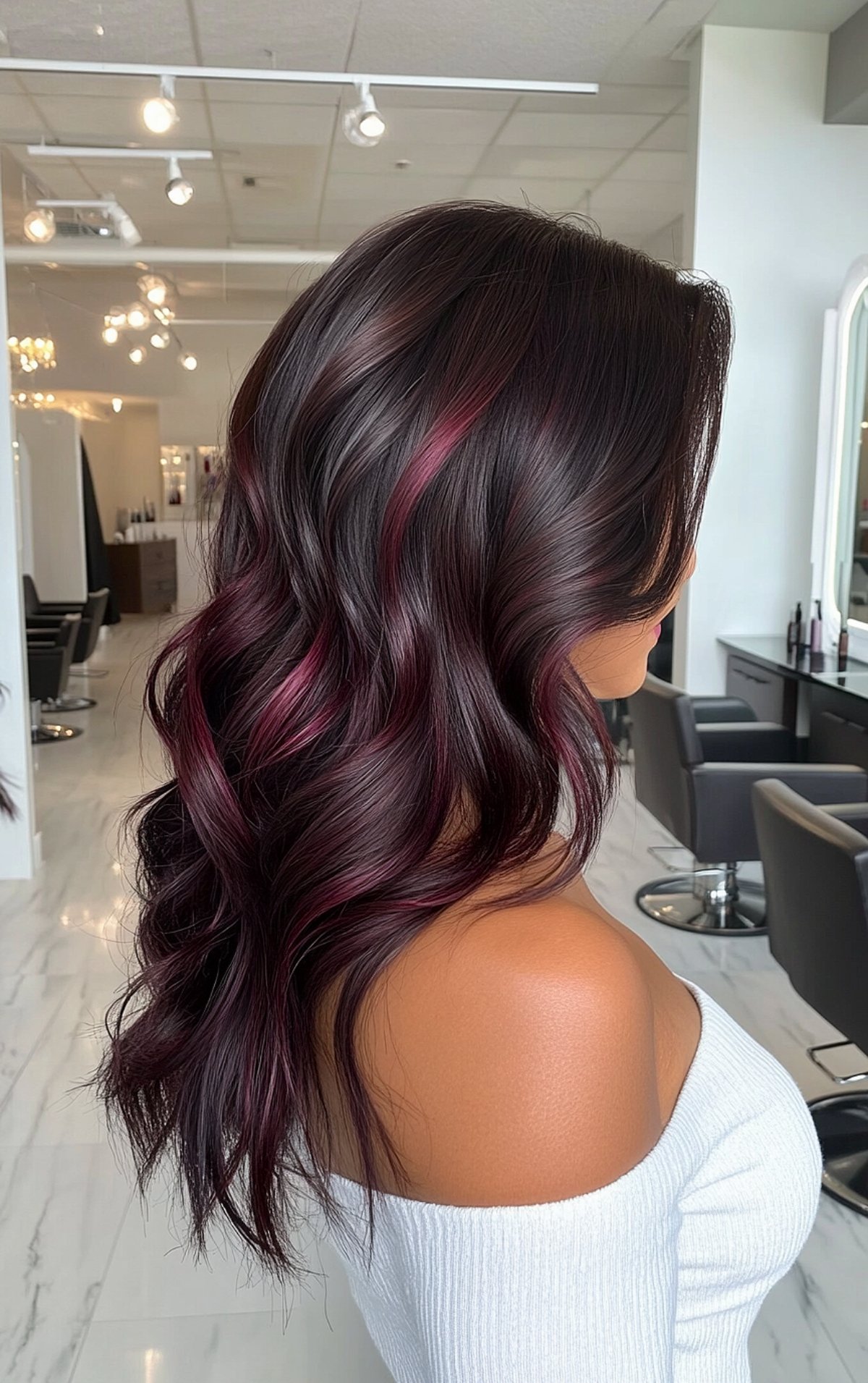 Espresso hair with burgundy highlights for long wavy hair