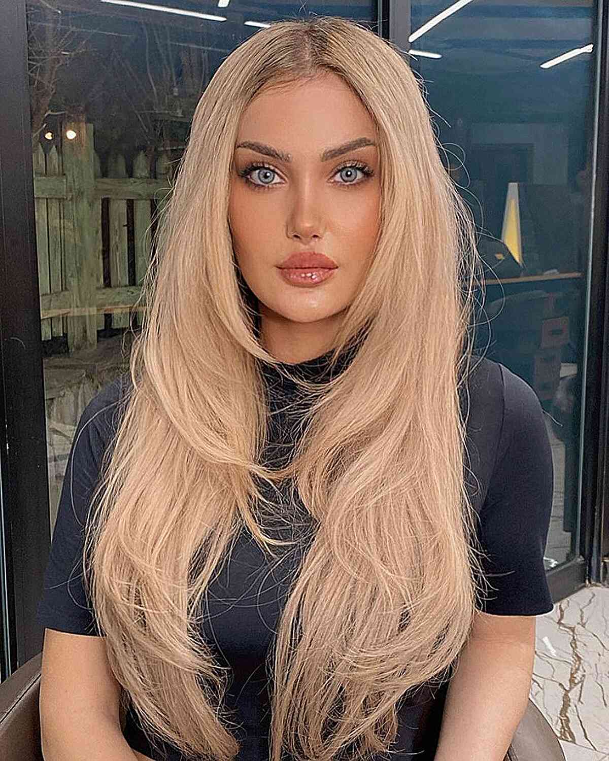 Extra Long Blonde Hair with Front Layers and a center part with wispy ends
