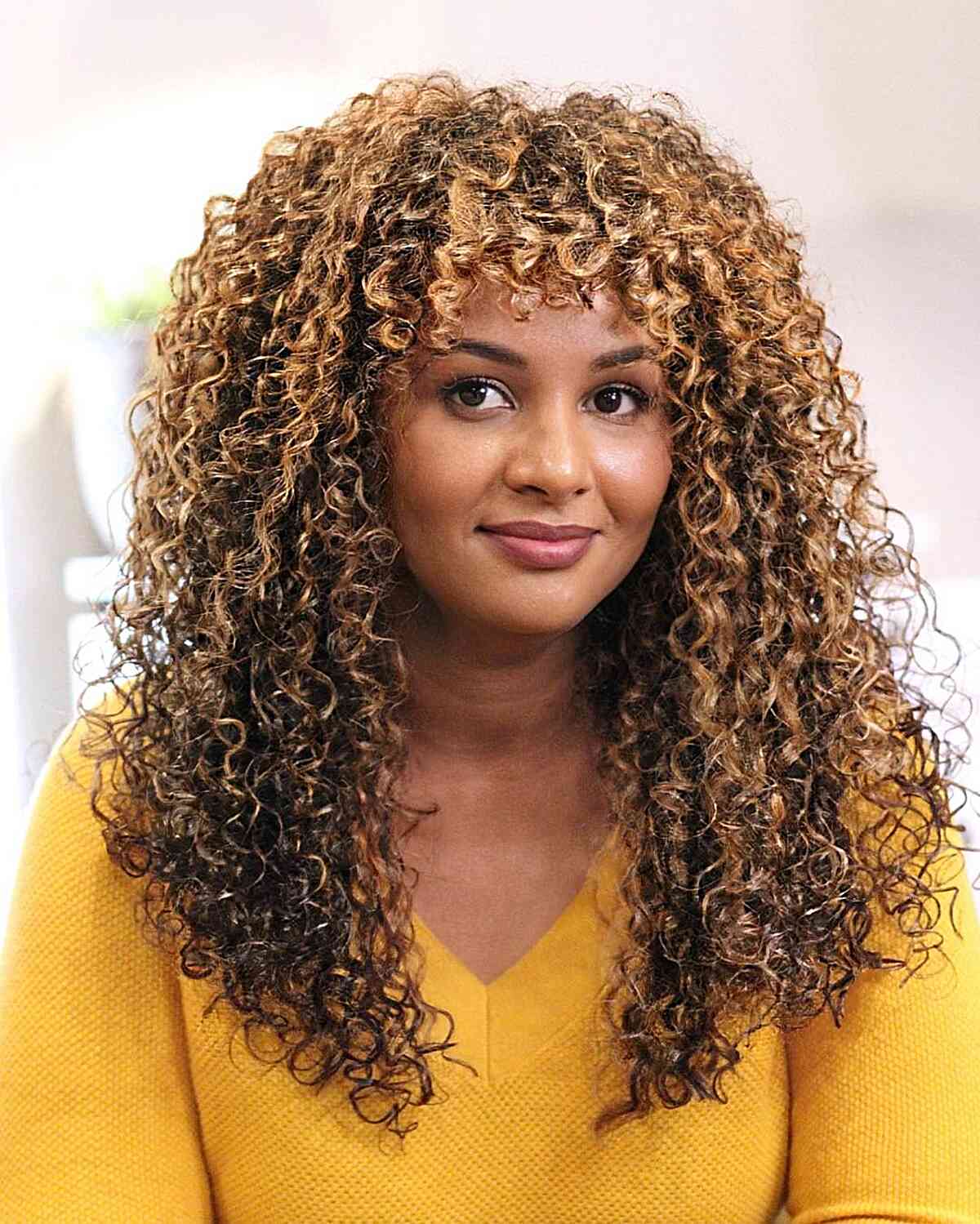 Extra Long Thick Curls with Layers for black women with blonde highlights