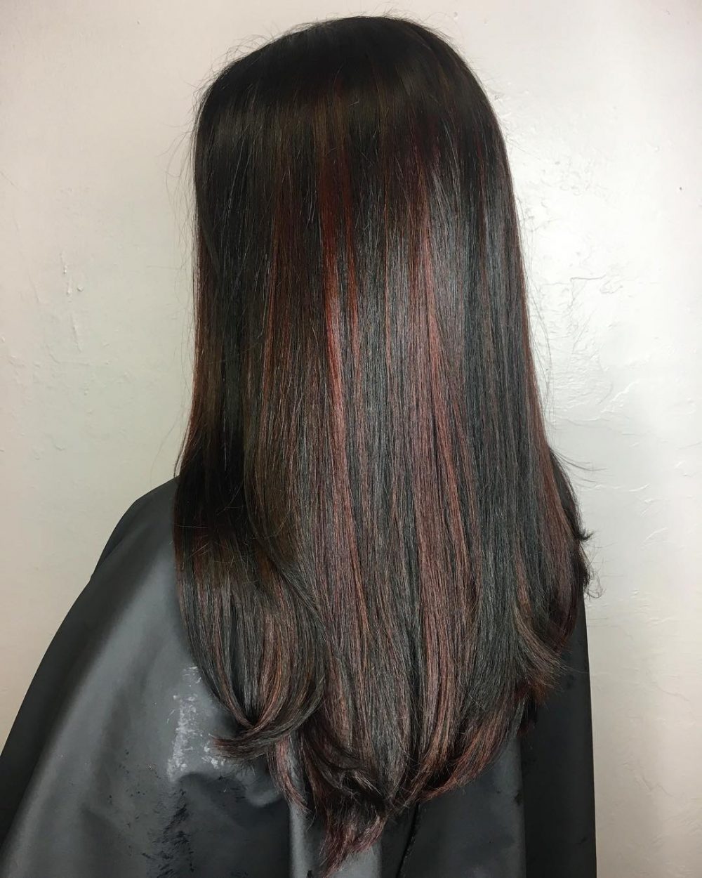 Dark Red Peekaboo Highlights on Dark Hair