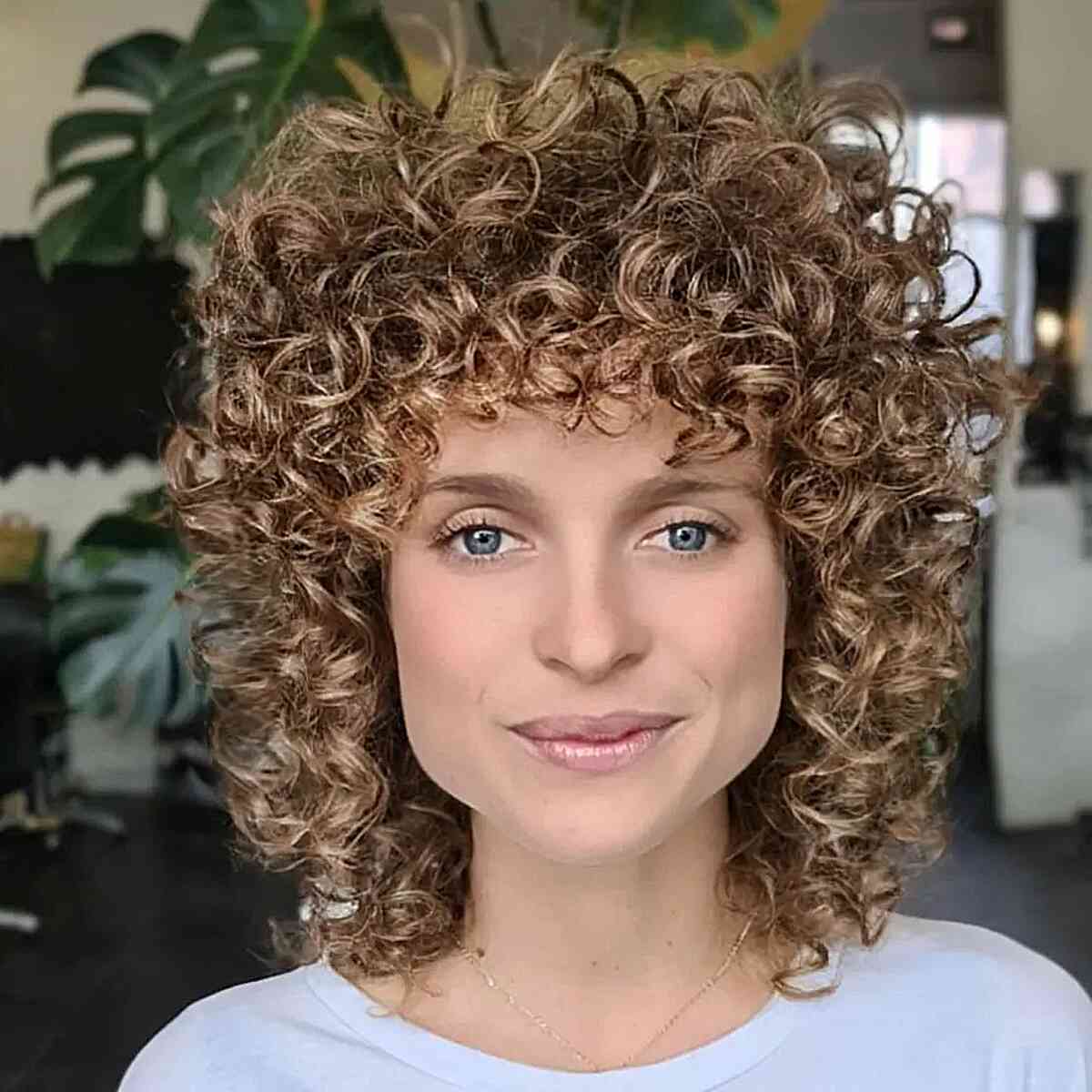 Face-Framing Bangs for Curly Hair and Square Faces