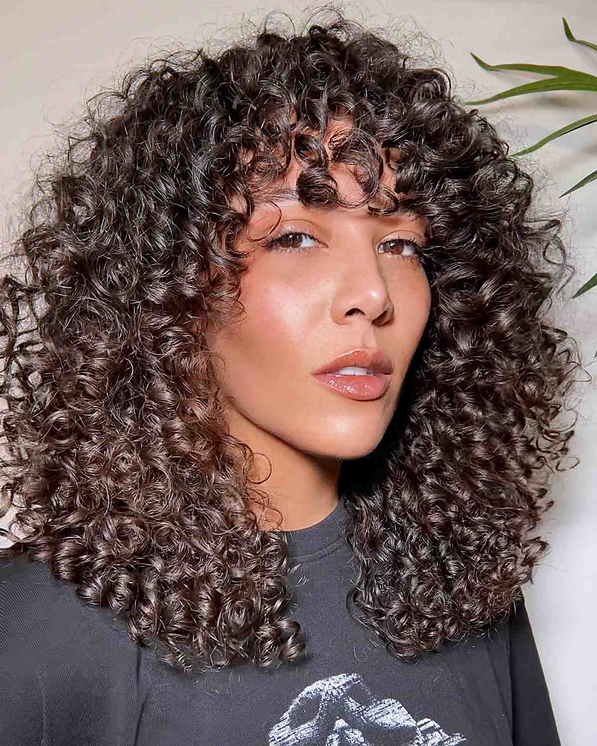 face-framing curly cut with fringe