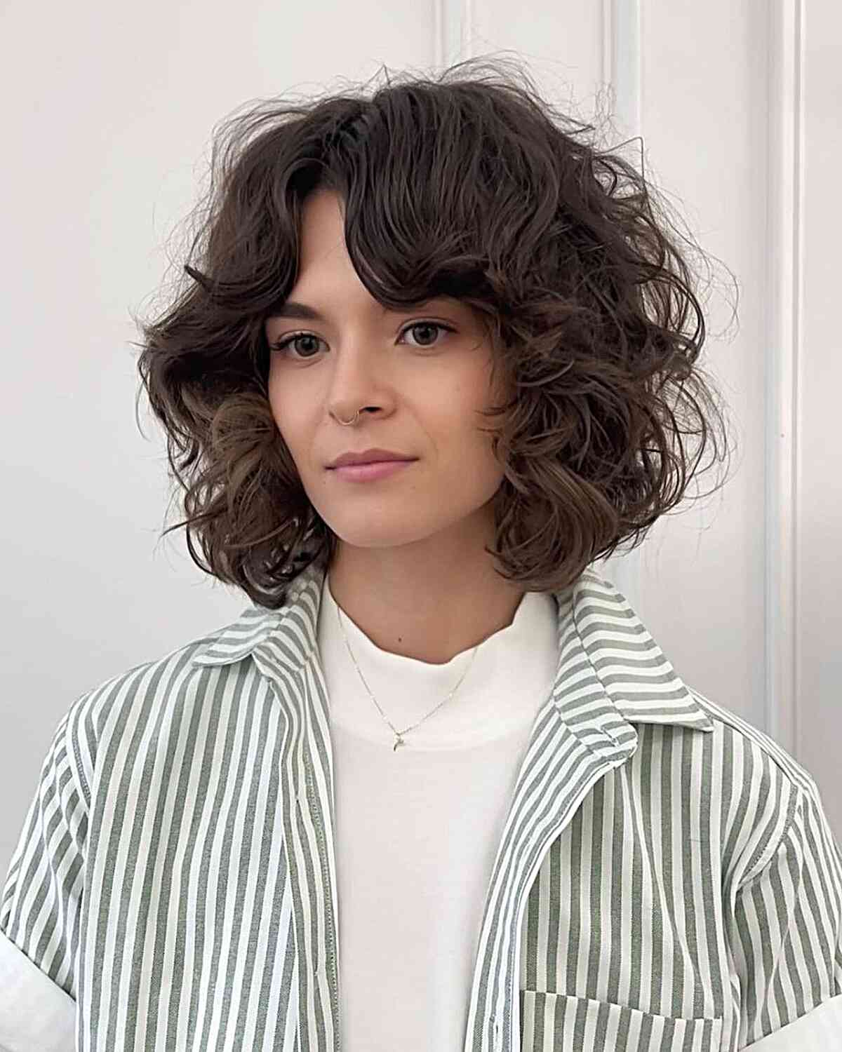 Face-Framing Curly Lob and Curtain Bangs for Thick Hair