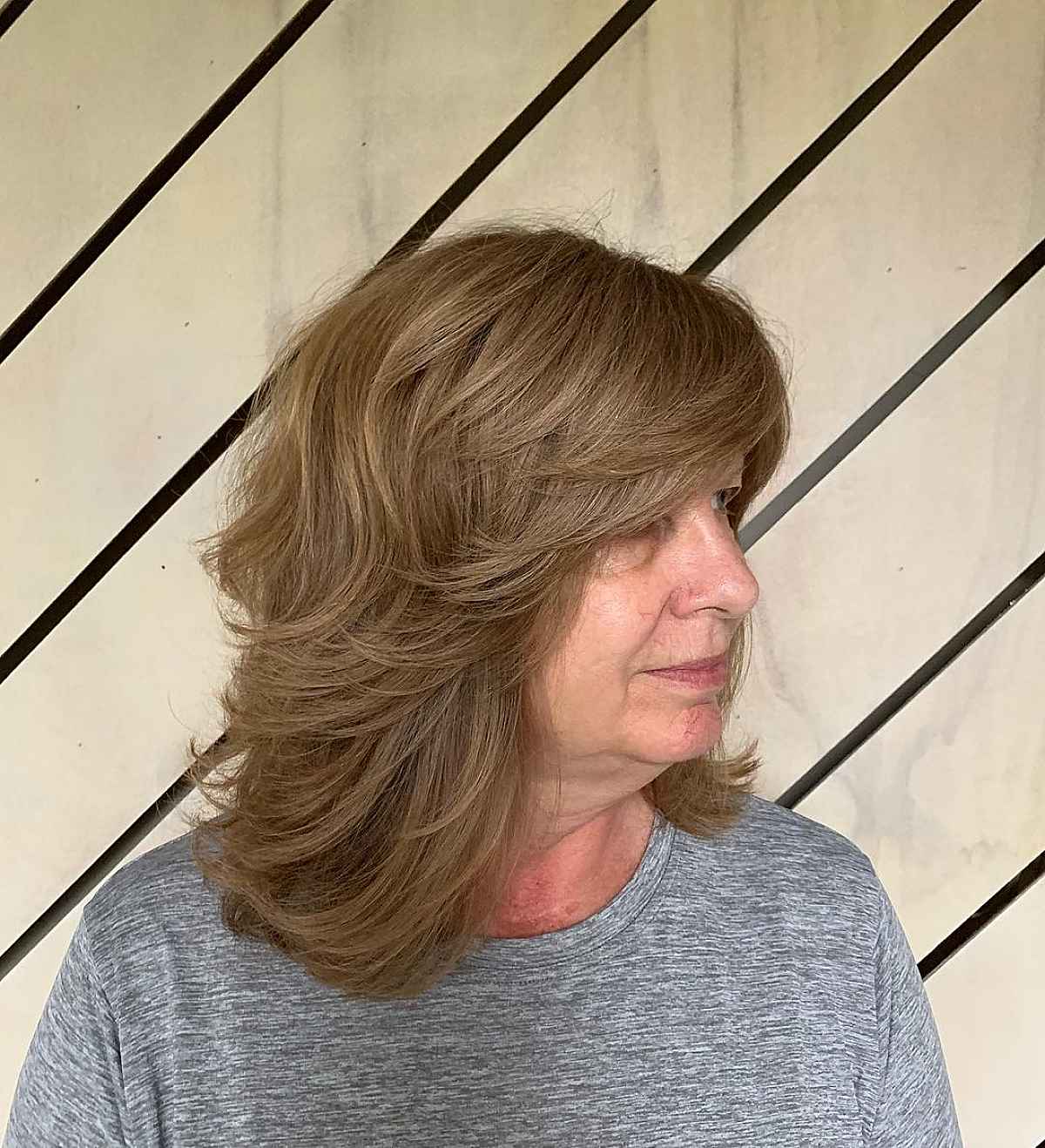 Face-Framing Layers and Side-Swept Bangs on a Shag