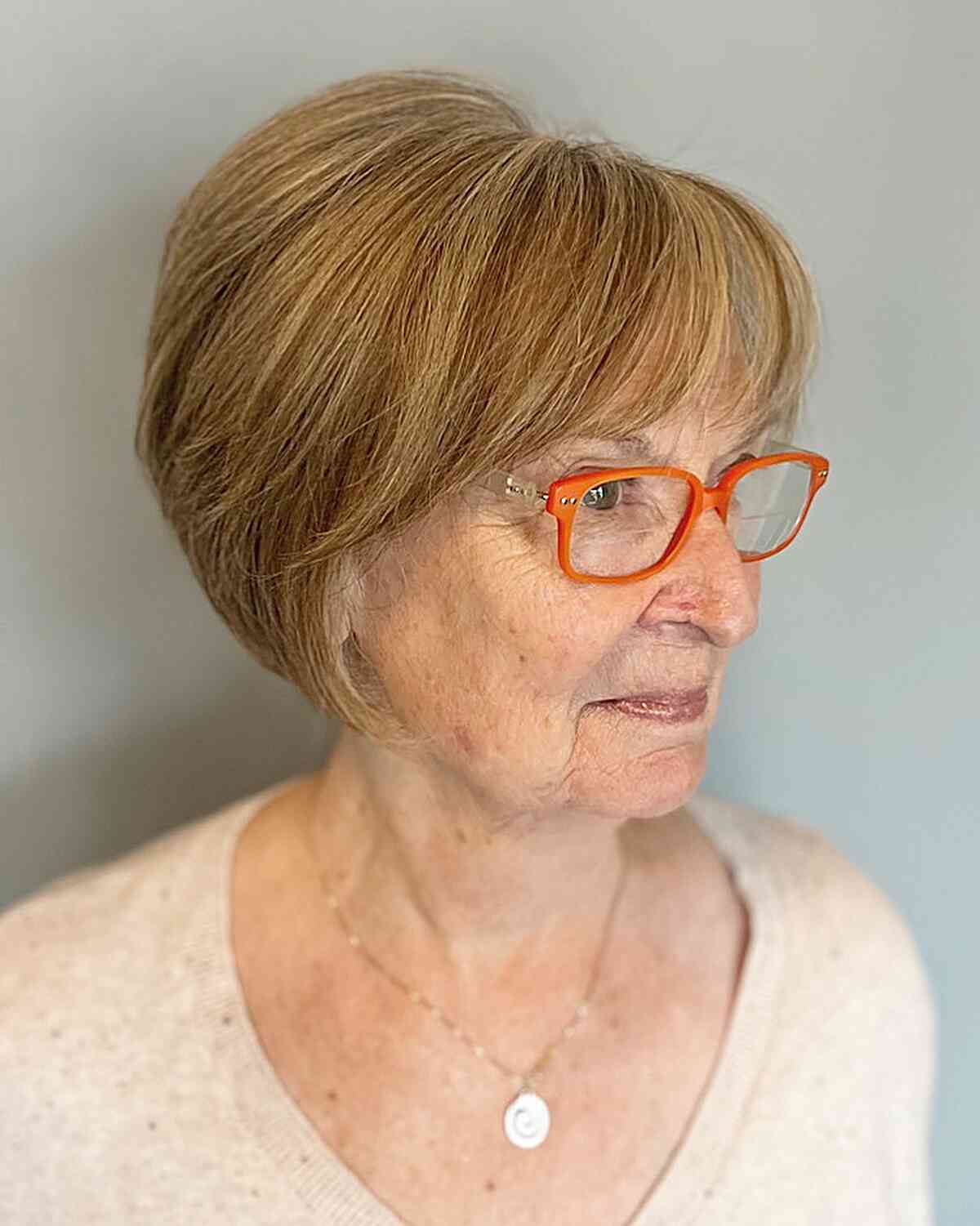 Face-Framing Wedge Short Bob with Bangs for senior ladies in their 60s