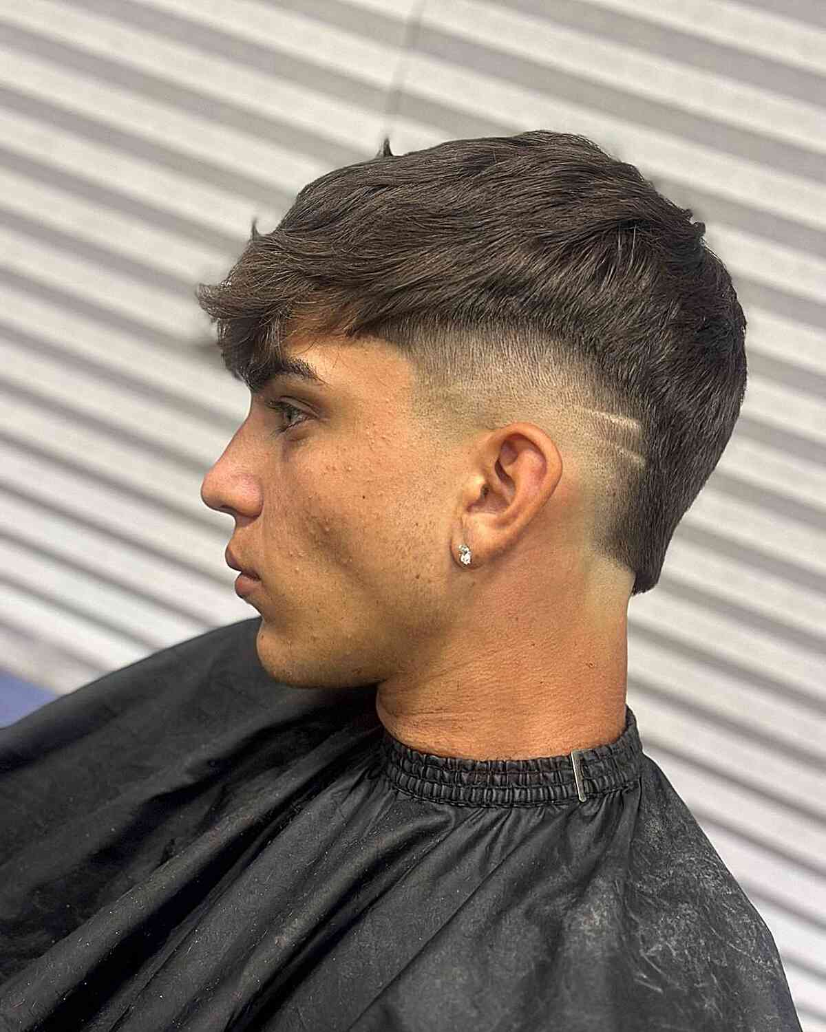 Fade Burst Haircut with Bangs and shaved lines for men