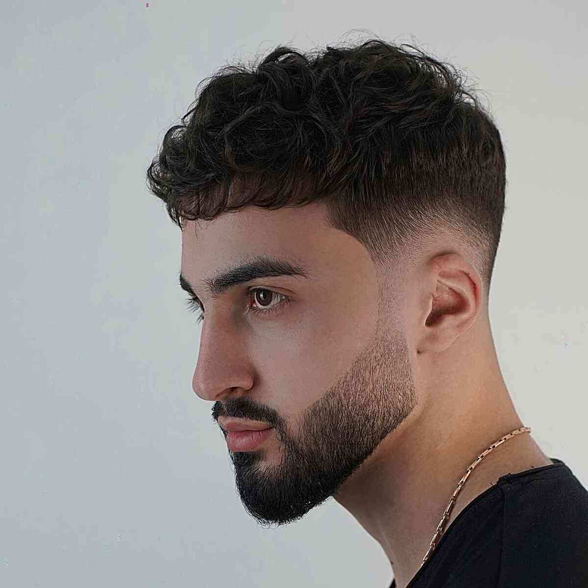 Faded Curly Edgar Cut with Subtle Bangs on Boys with Beard