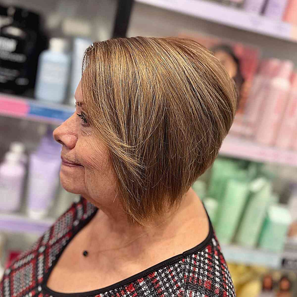 Fall-Inspired Honey Blonde with Root Retouch for Older Ladies Aged 70