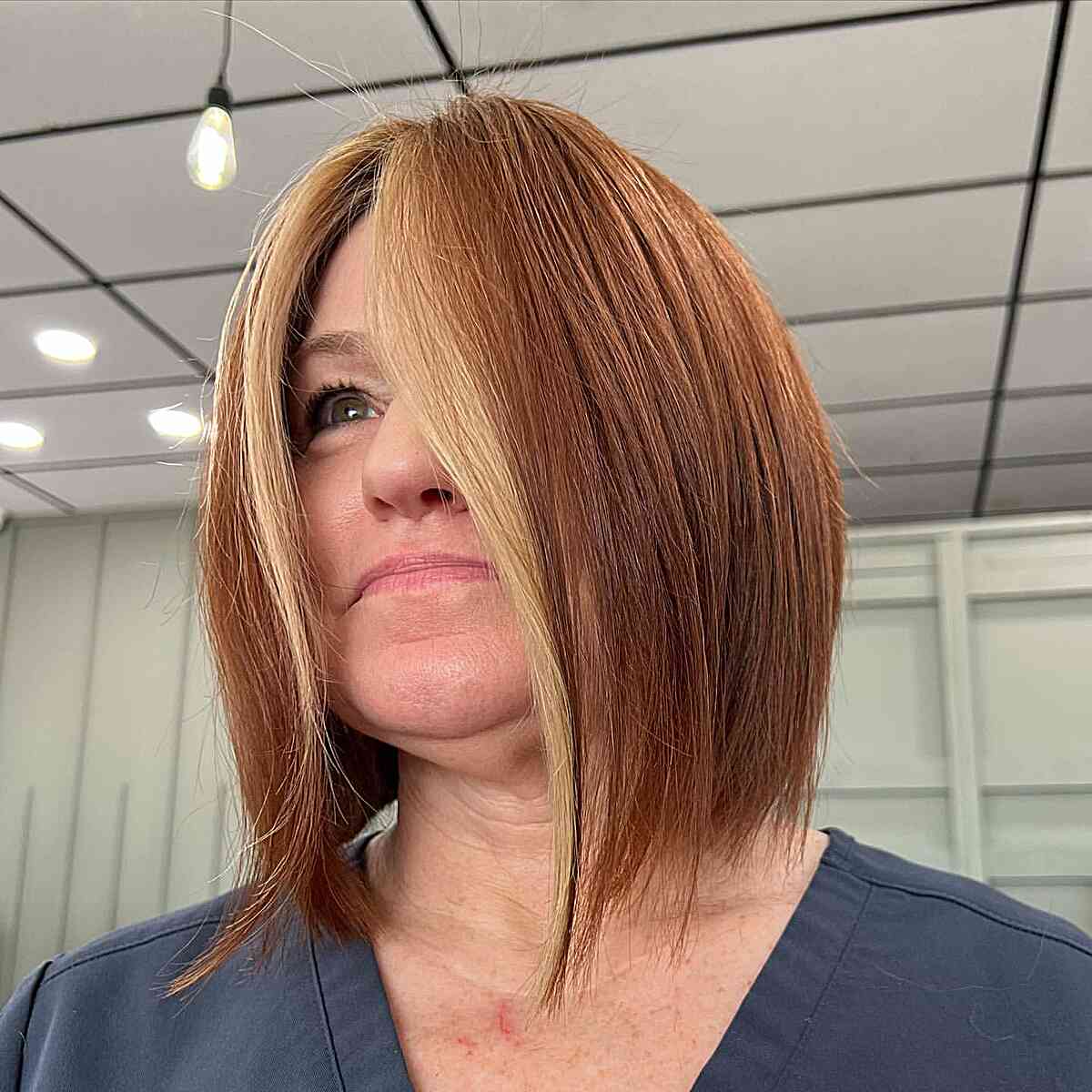 Neck-Length Sleek Ginger Bob with Blonde Money Piece for Ladies Over 50