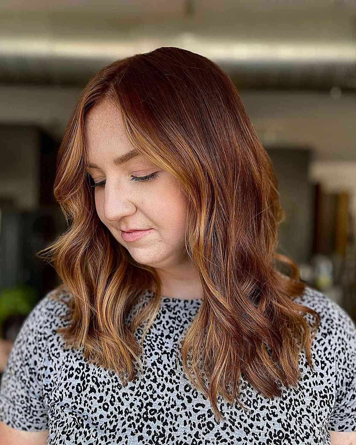 Fall Mid-Length Cut with Warm Auburn and Face-Framing Highlights for Women Over Forty