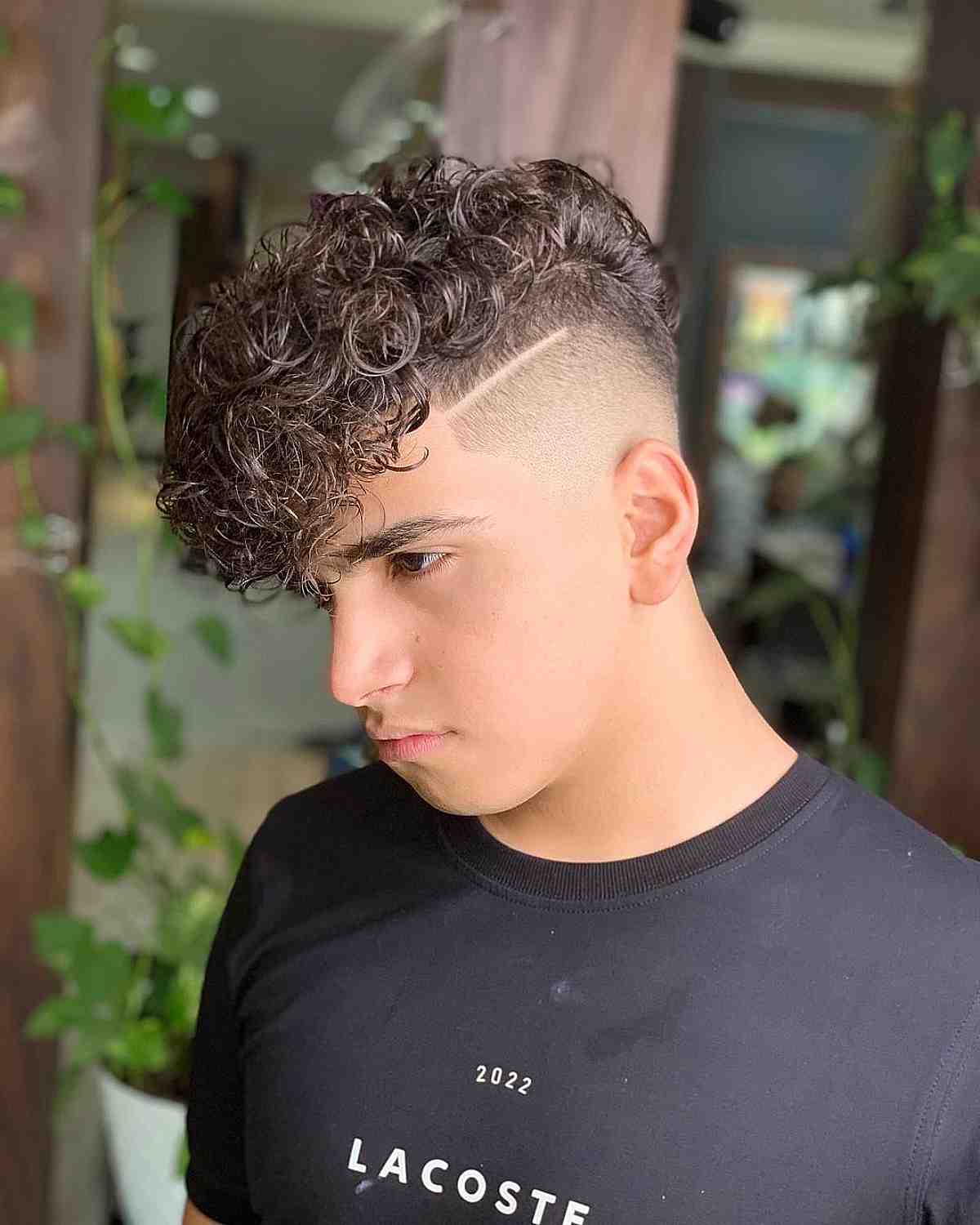 Fancy Curls with Tapered Design and Bangs for Guys