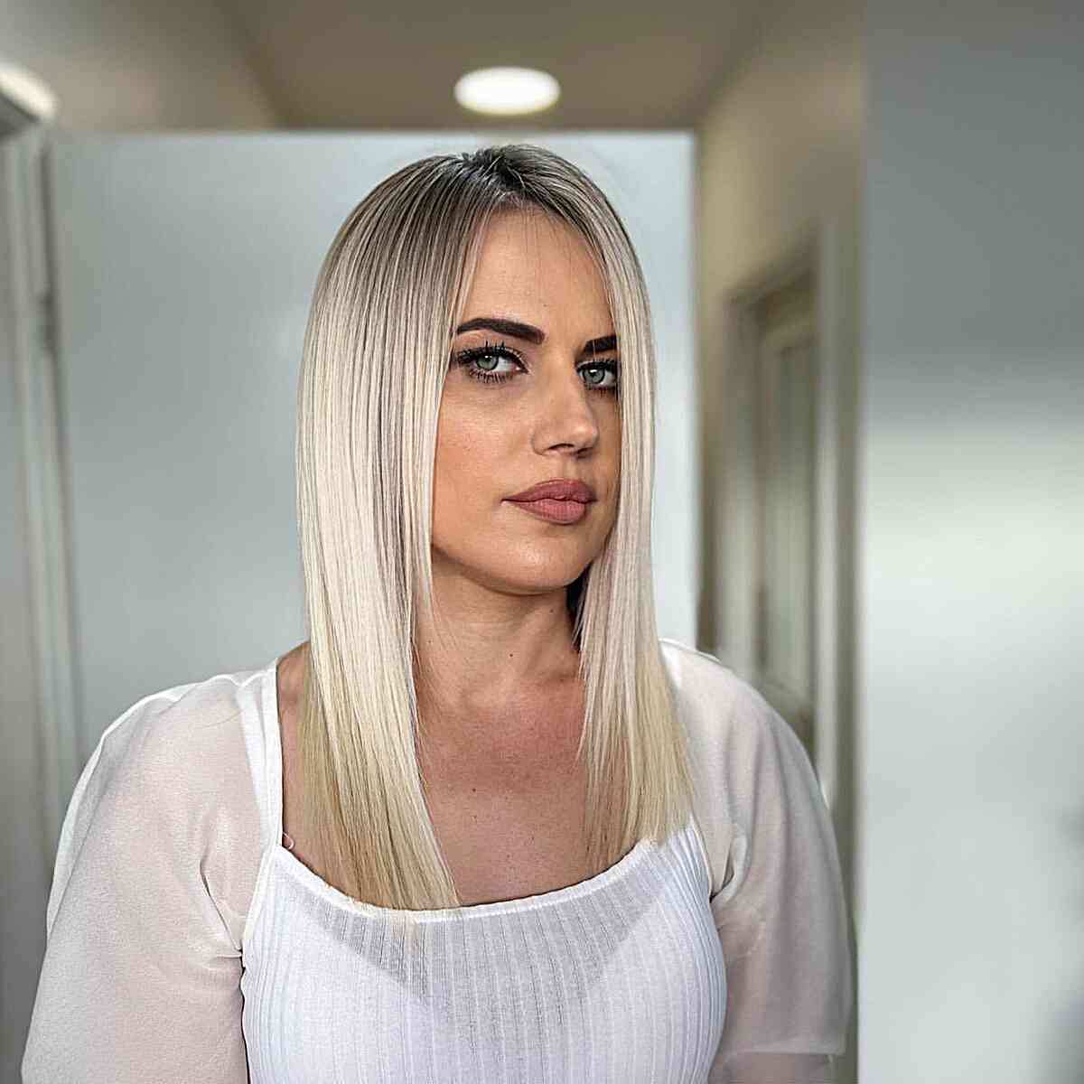 Fashionable Platinum Straight Fine Hair for ladies with an off center part