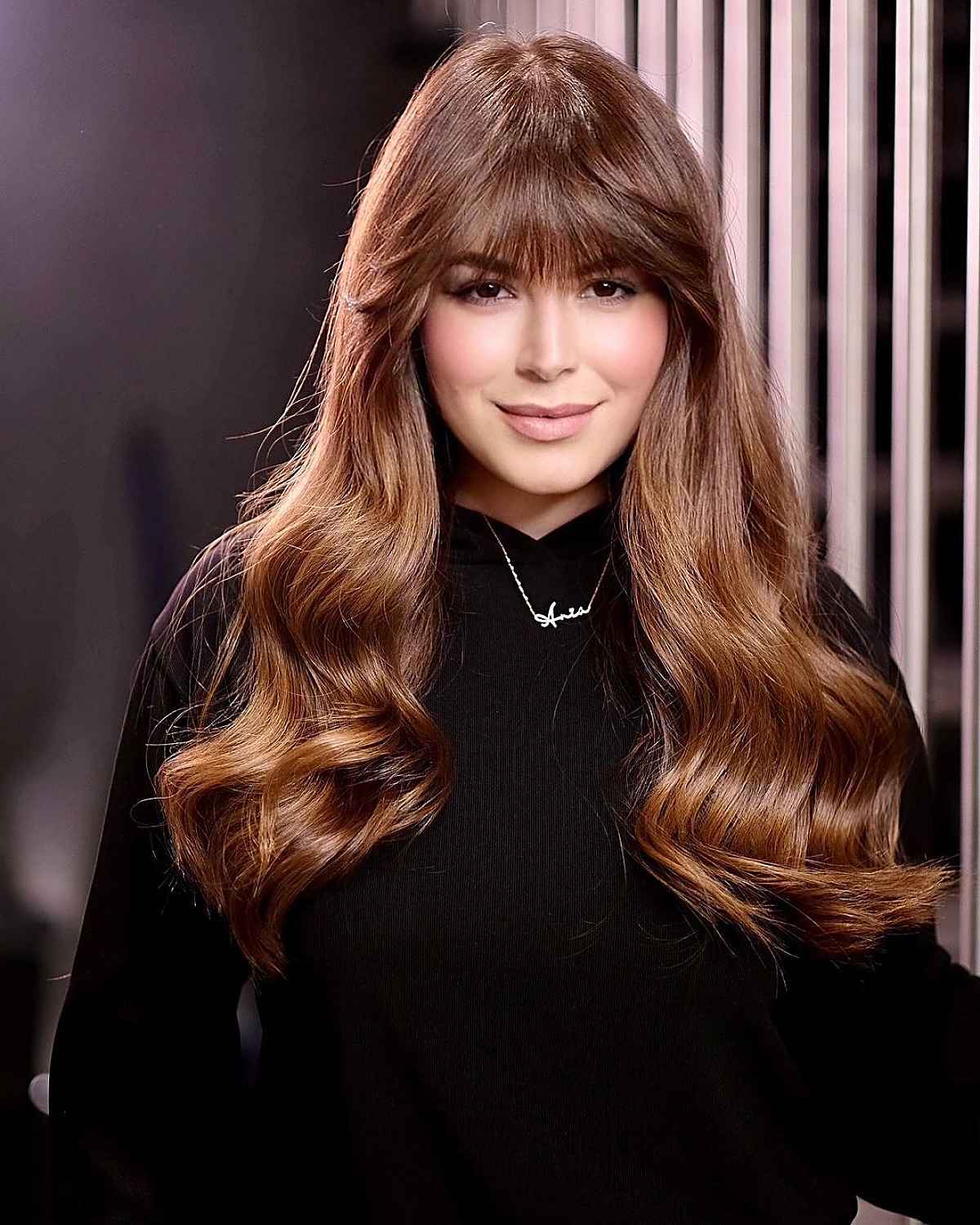 low-maintenance feathered bangs with long hair