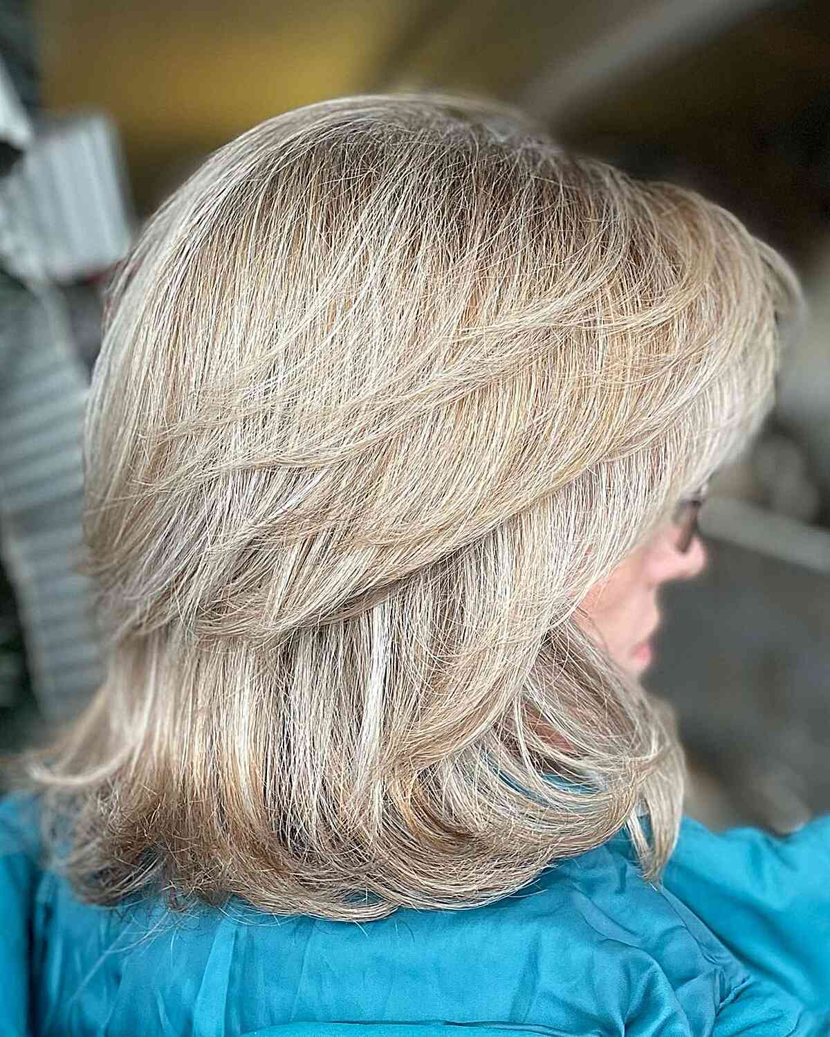 Shoulder-Length Feathered Lob with Wispy Layers for Mature Women