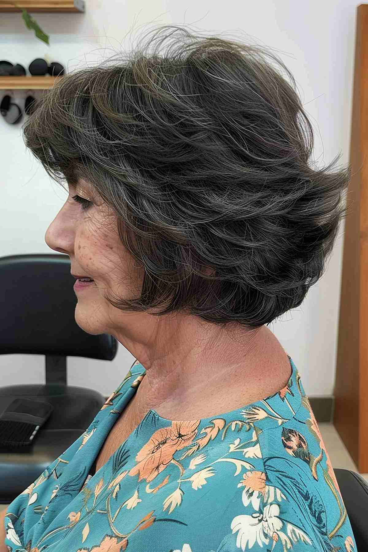 Feathered shaggy bob for older women with layered hair.