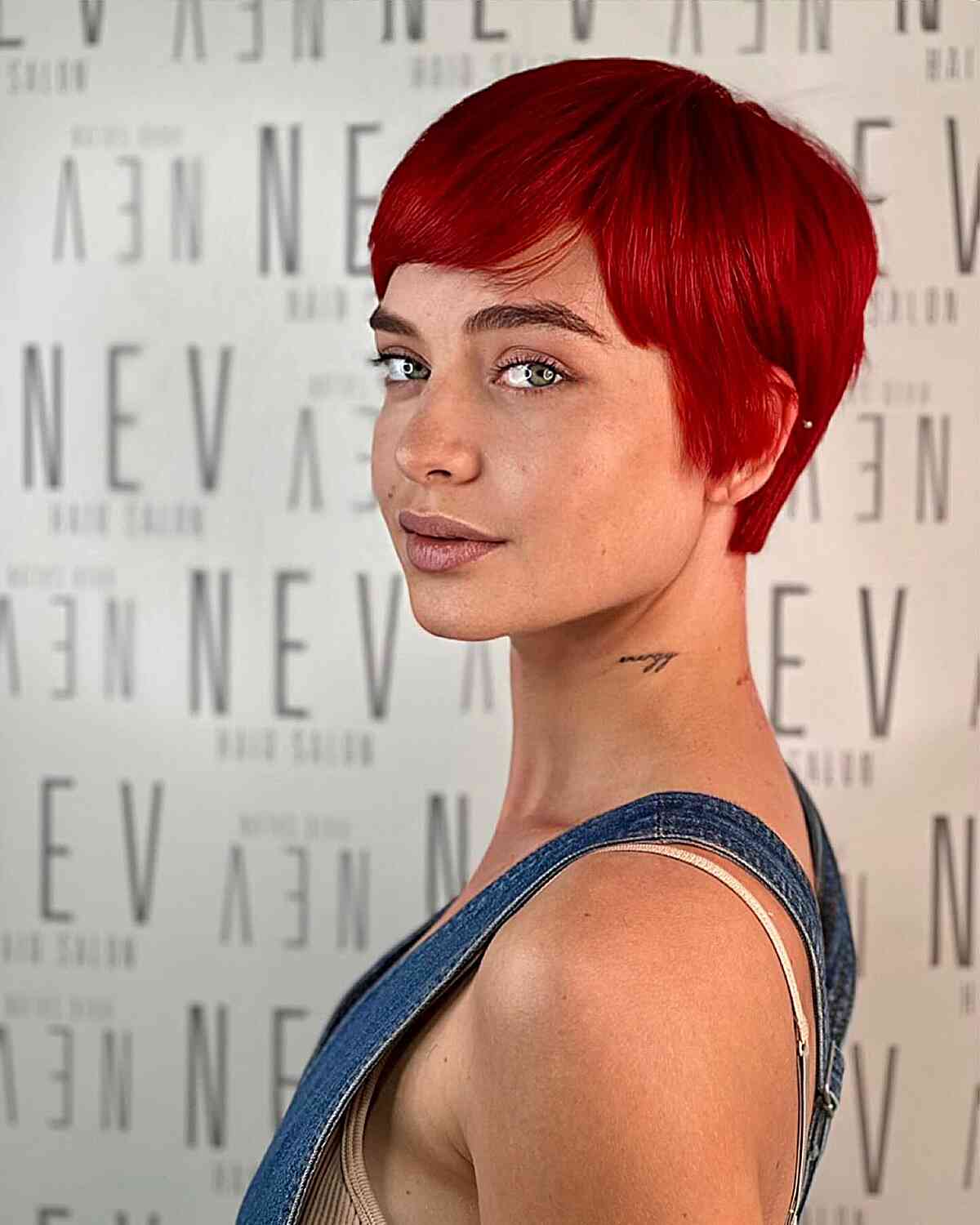 Feminine Fiery Red Pixie with Soft Layers