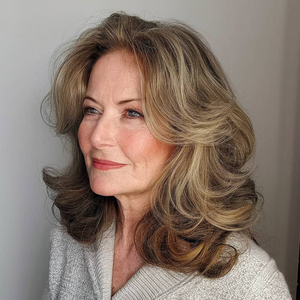 Flareflow haircut with voluminous layers, adding bounce and body for a glamorous, full-bodied look