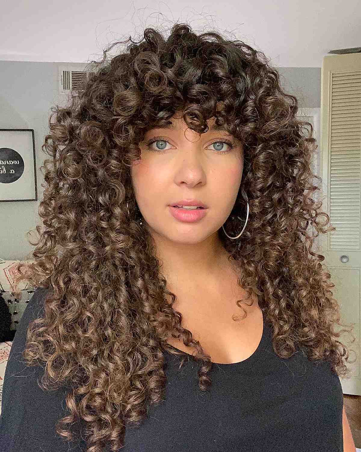 flattering bangs for curly hair